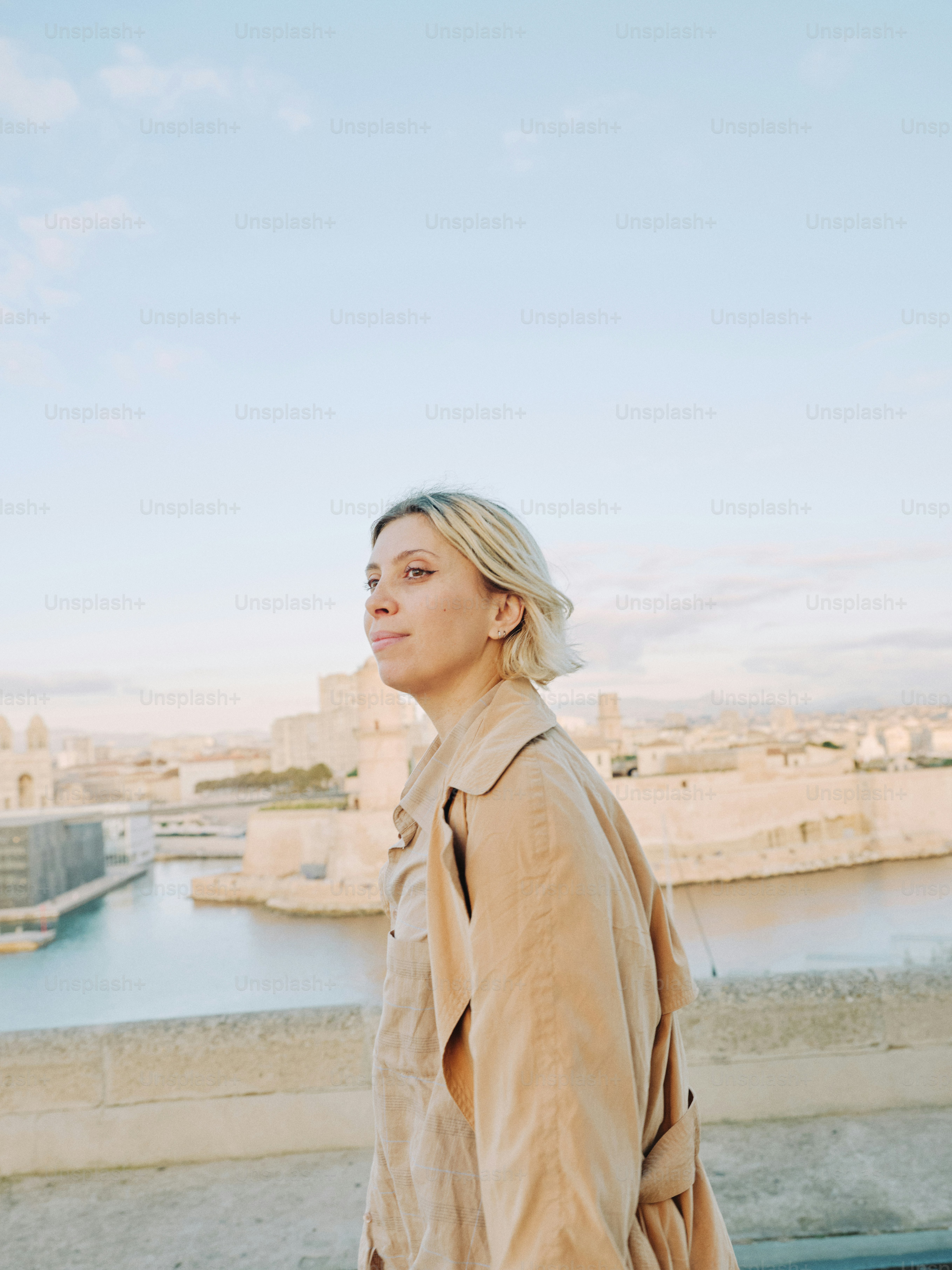 Woman gazes at a city from an elevated viewpoint. photo – Portrait ...