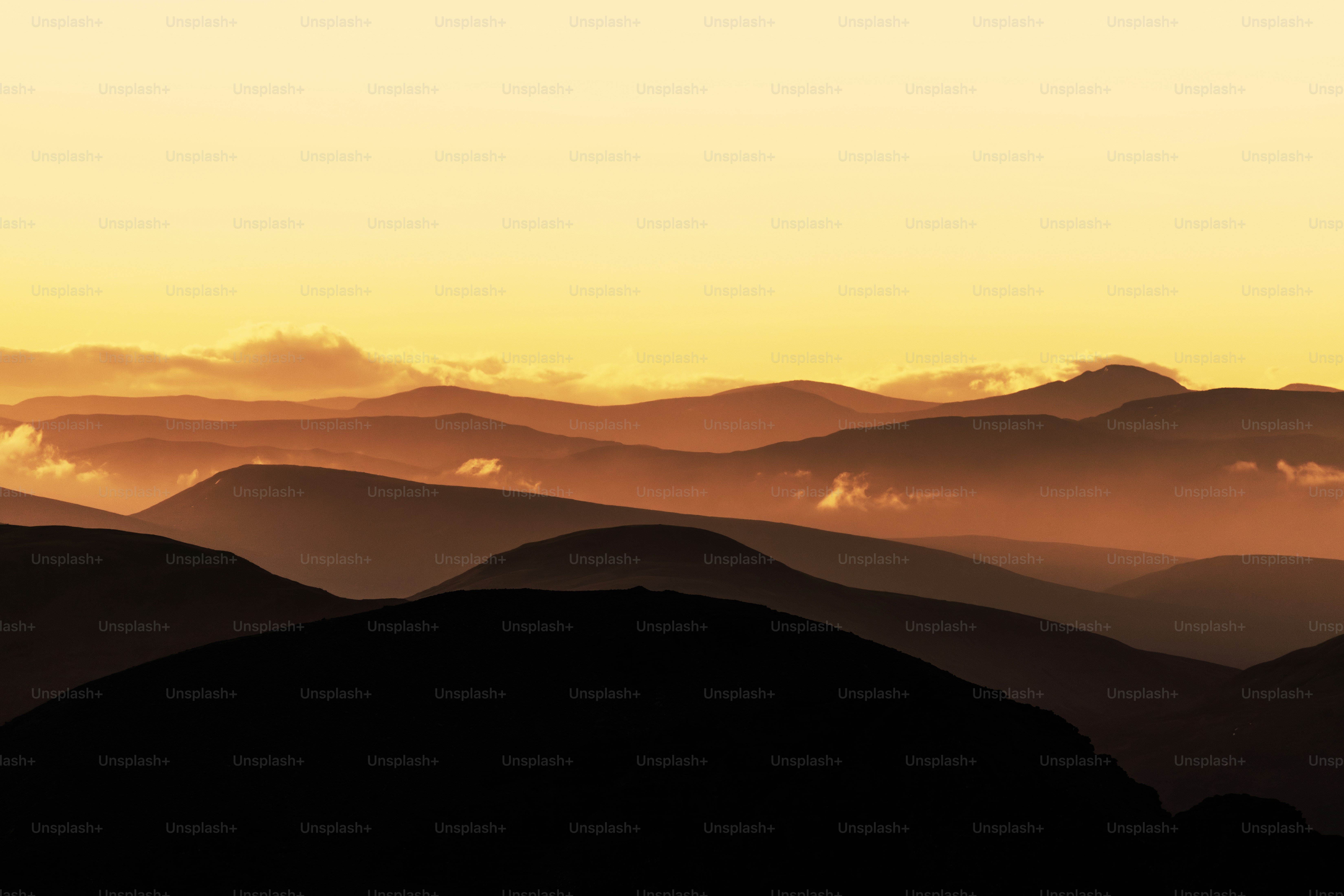 A view of a mountain range at sunset photo – Natural Image on Unsplash