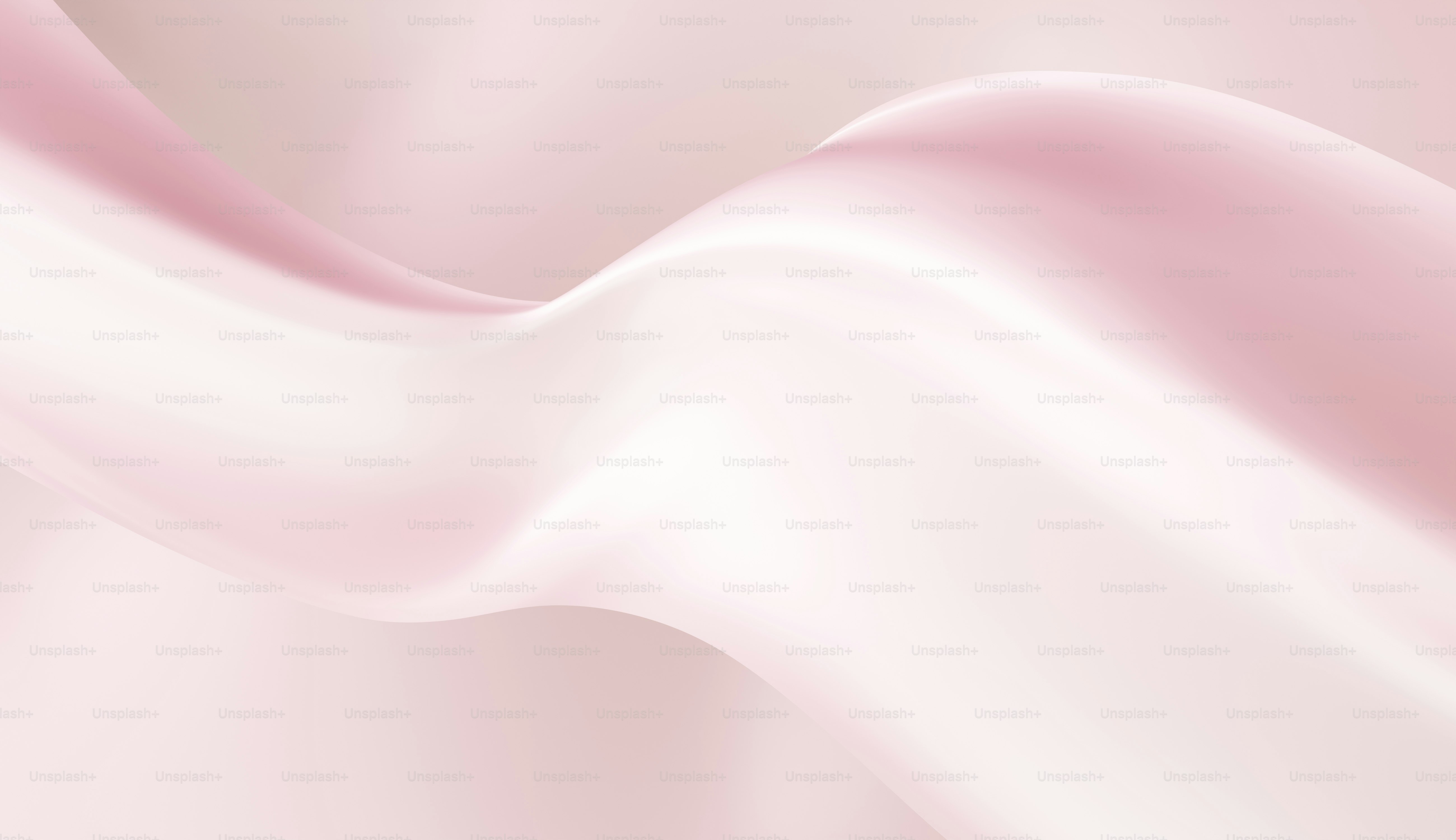 Nahaufnahme eines rosafarbenen Satinstoffs