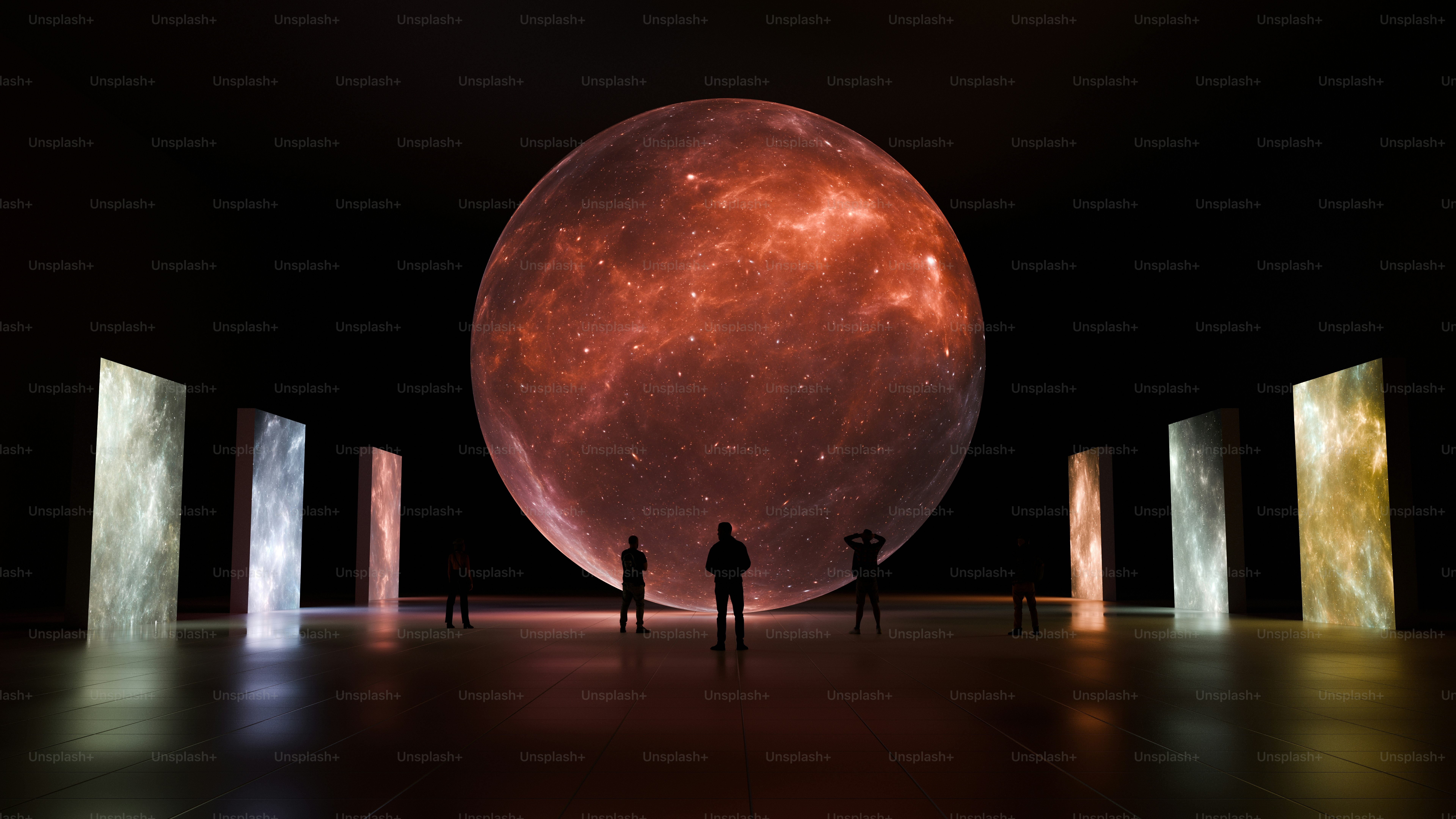 A group of people standing in front of a large object photo – Immersive ...