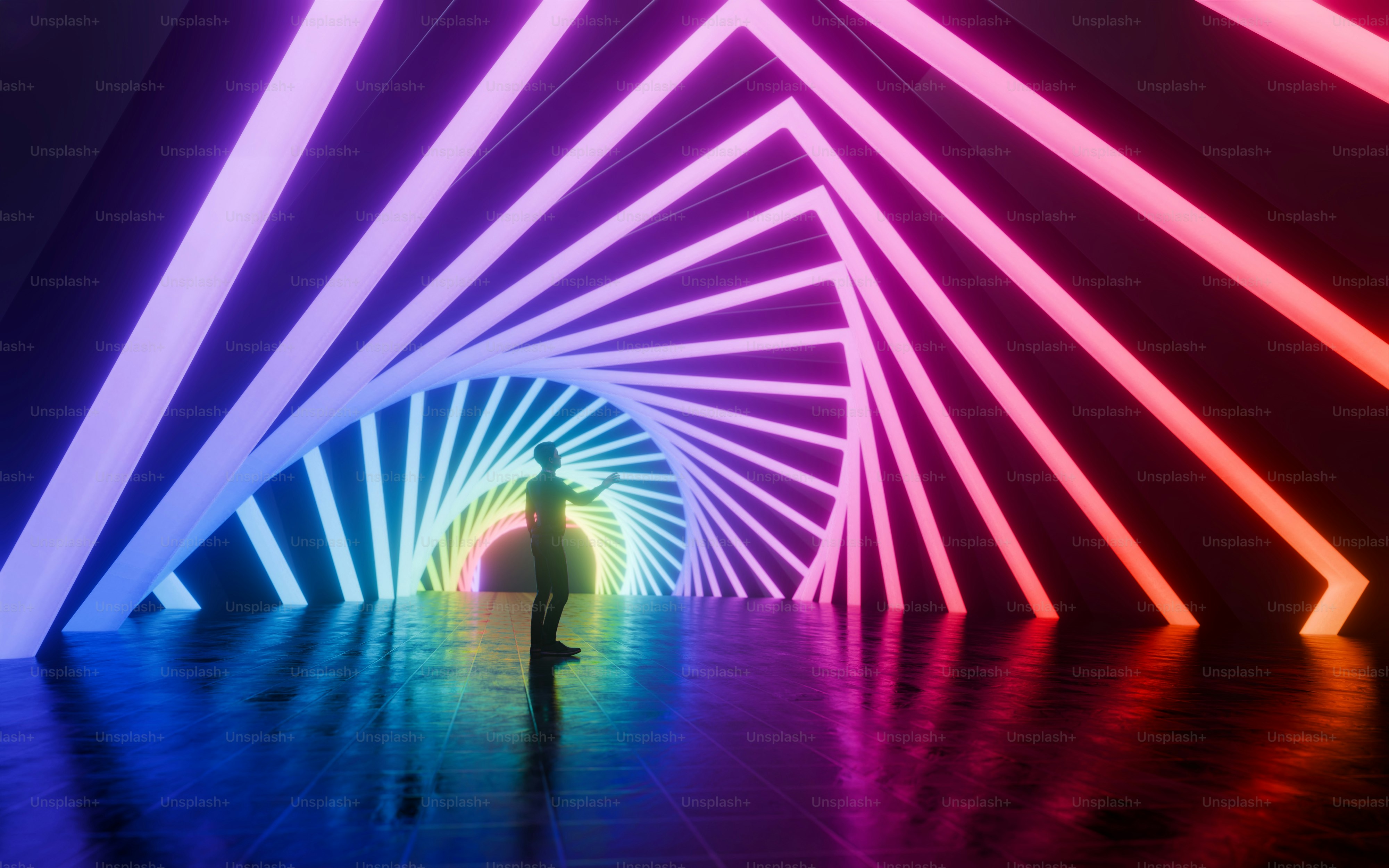 A person standing in a tunnel with neon lights