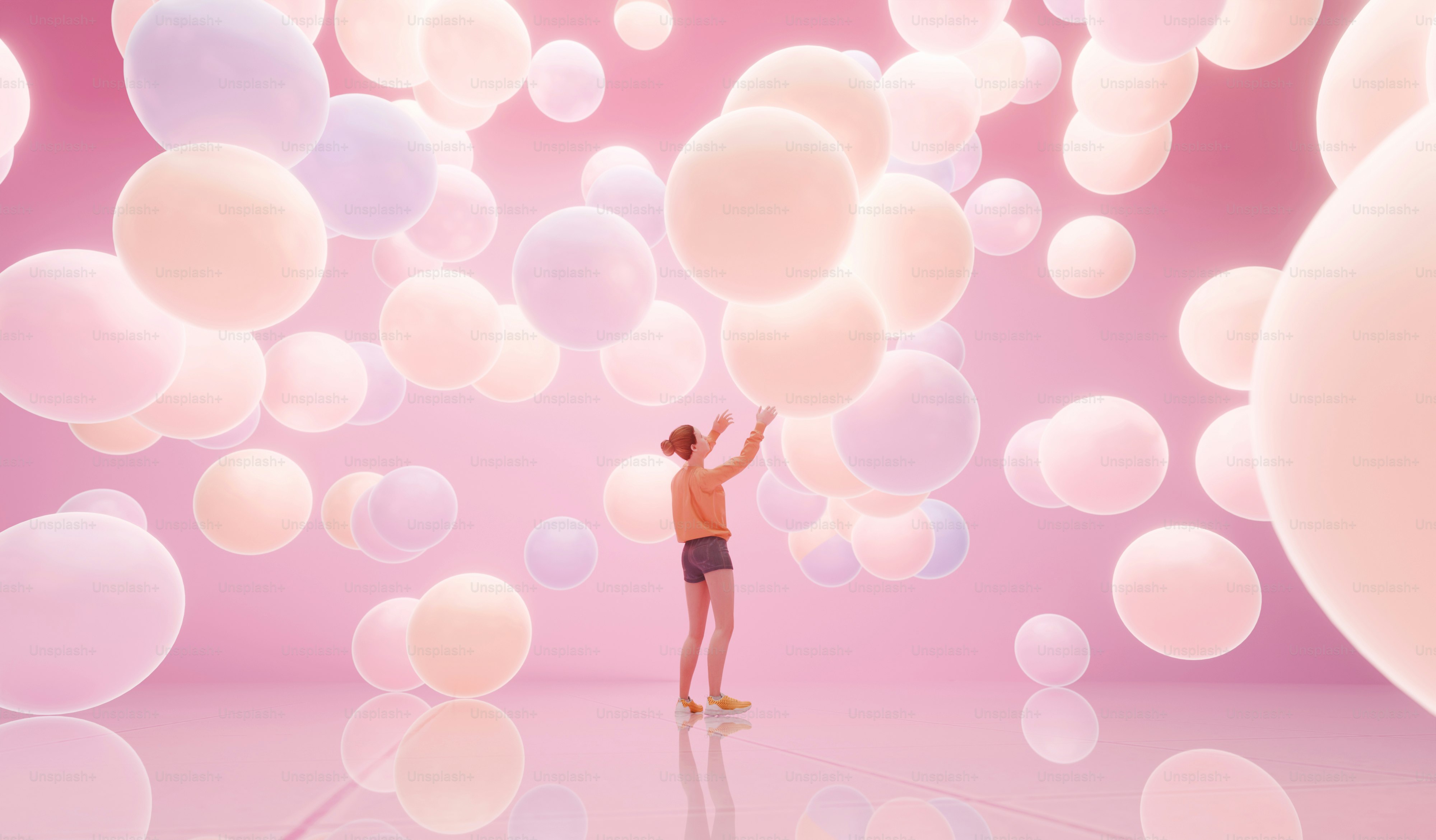 A person standing in front of a bunch of bubbles
