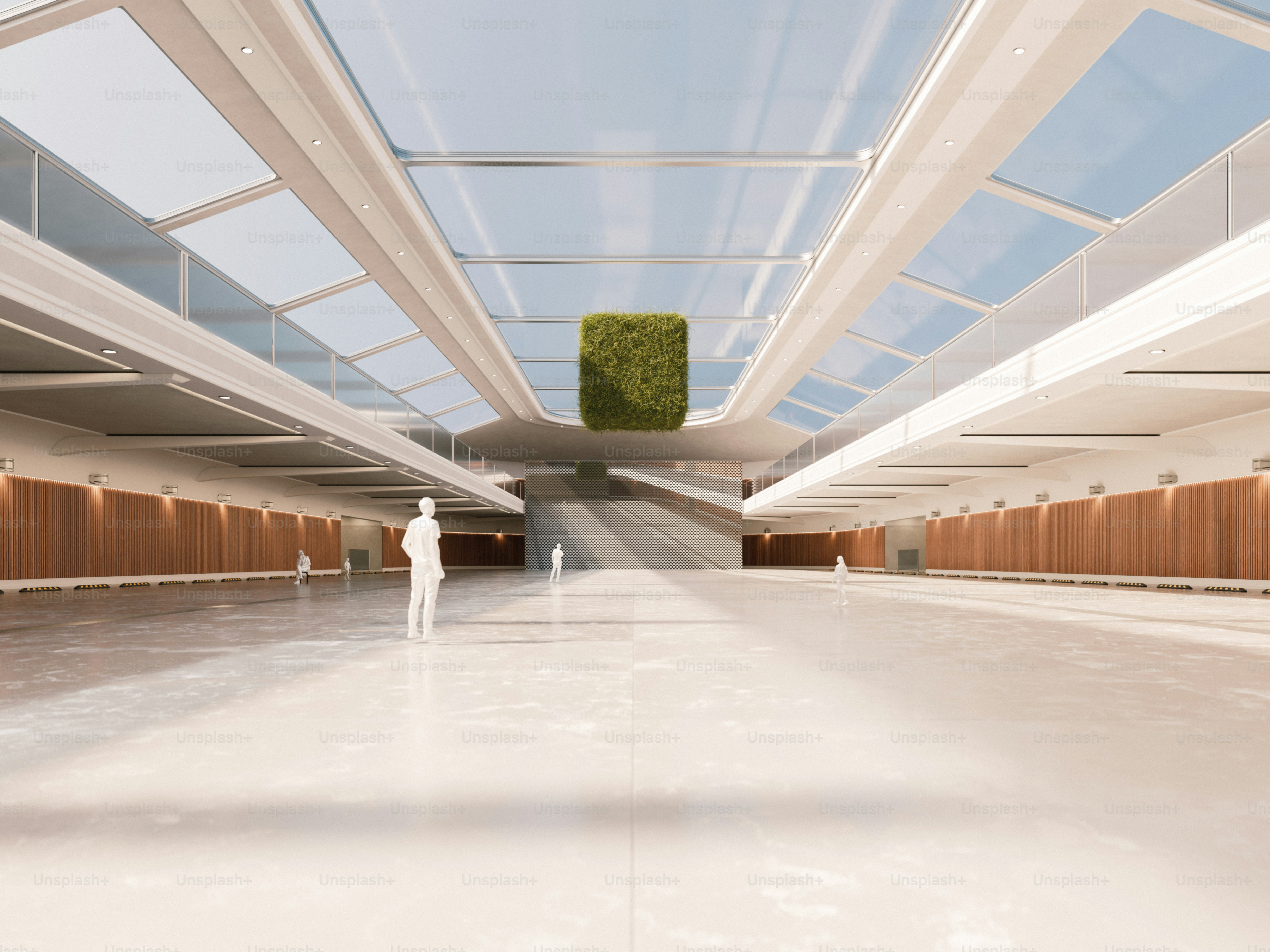 A person standing in a large room with a skylight
