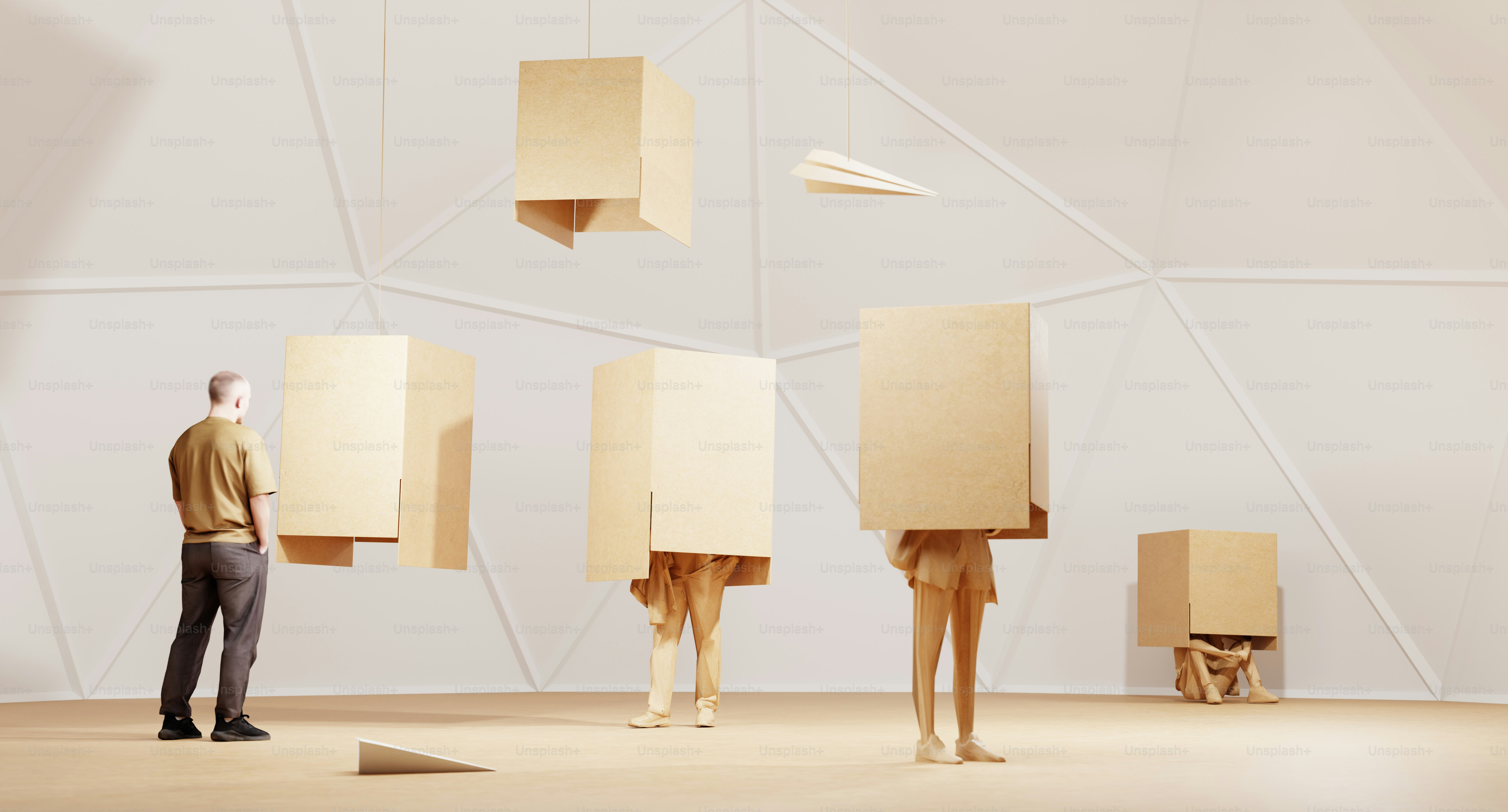 A man standing in front of a group of cardboard boxes