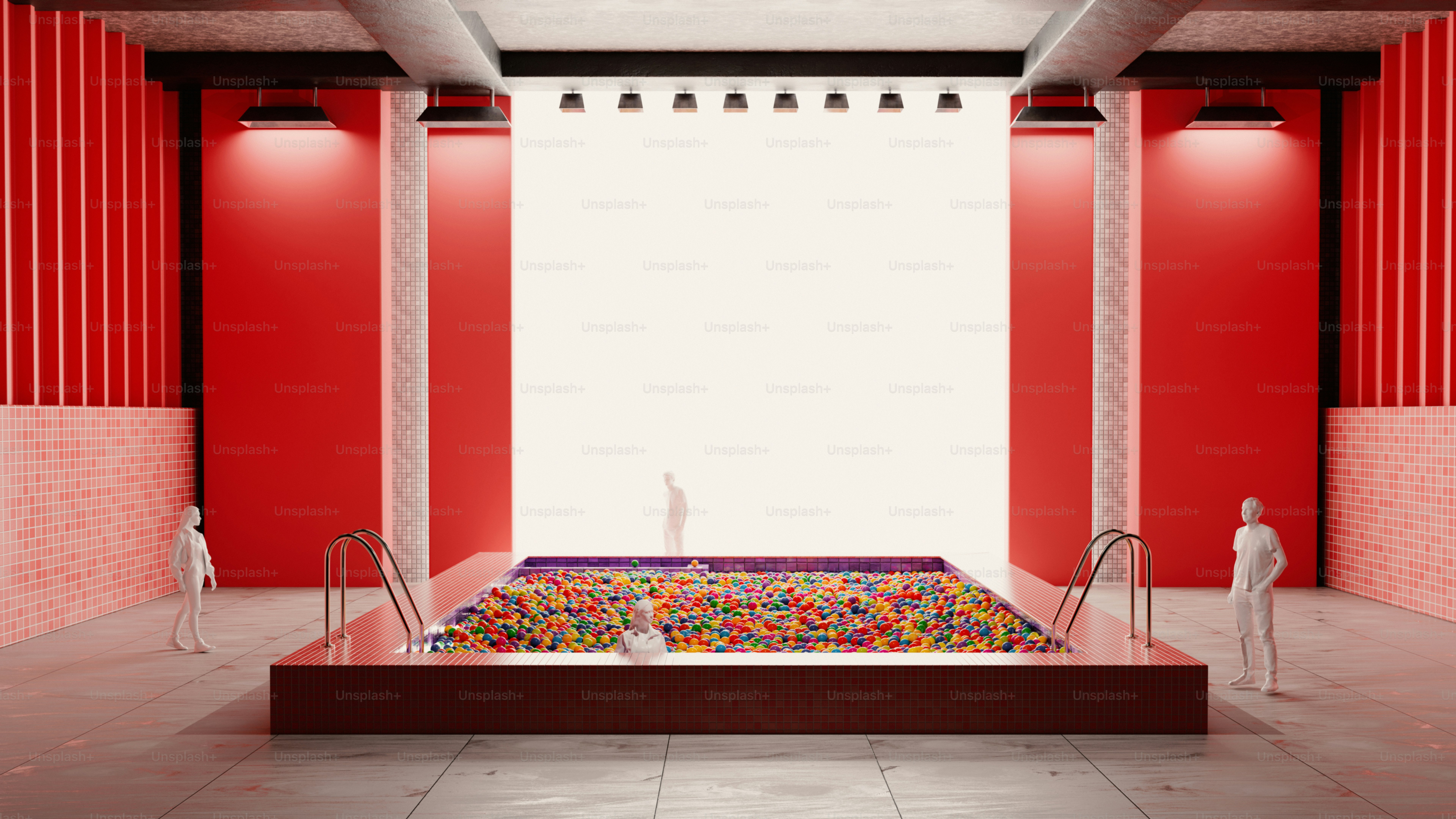 A red room with a stage and people in it