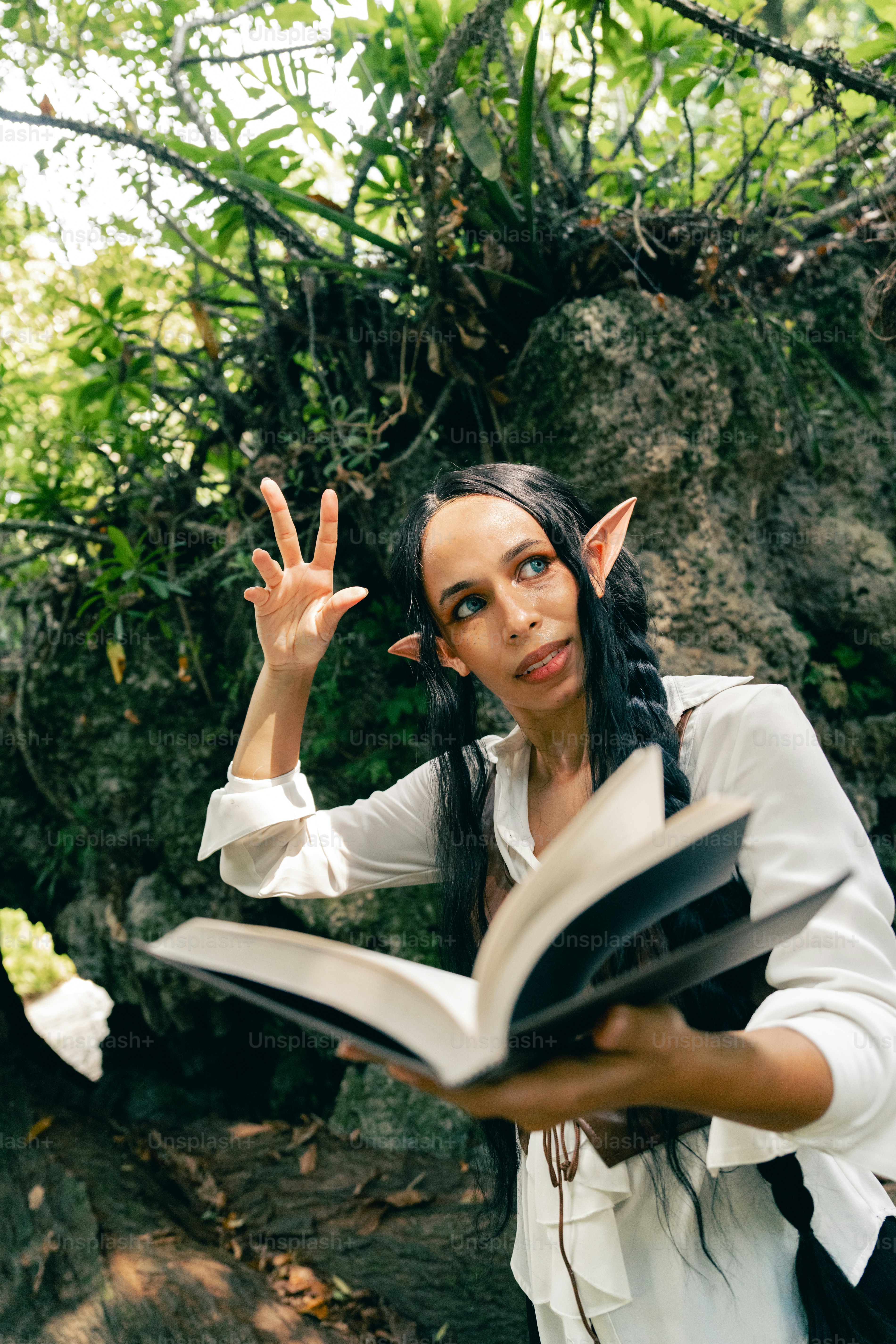 A woman holding a book in her hands