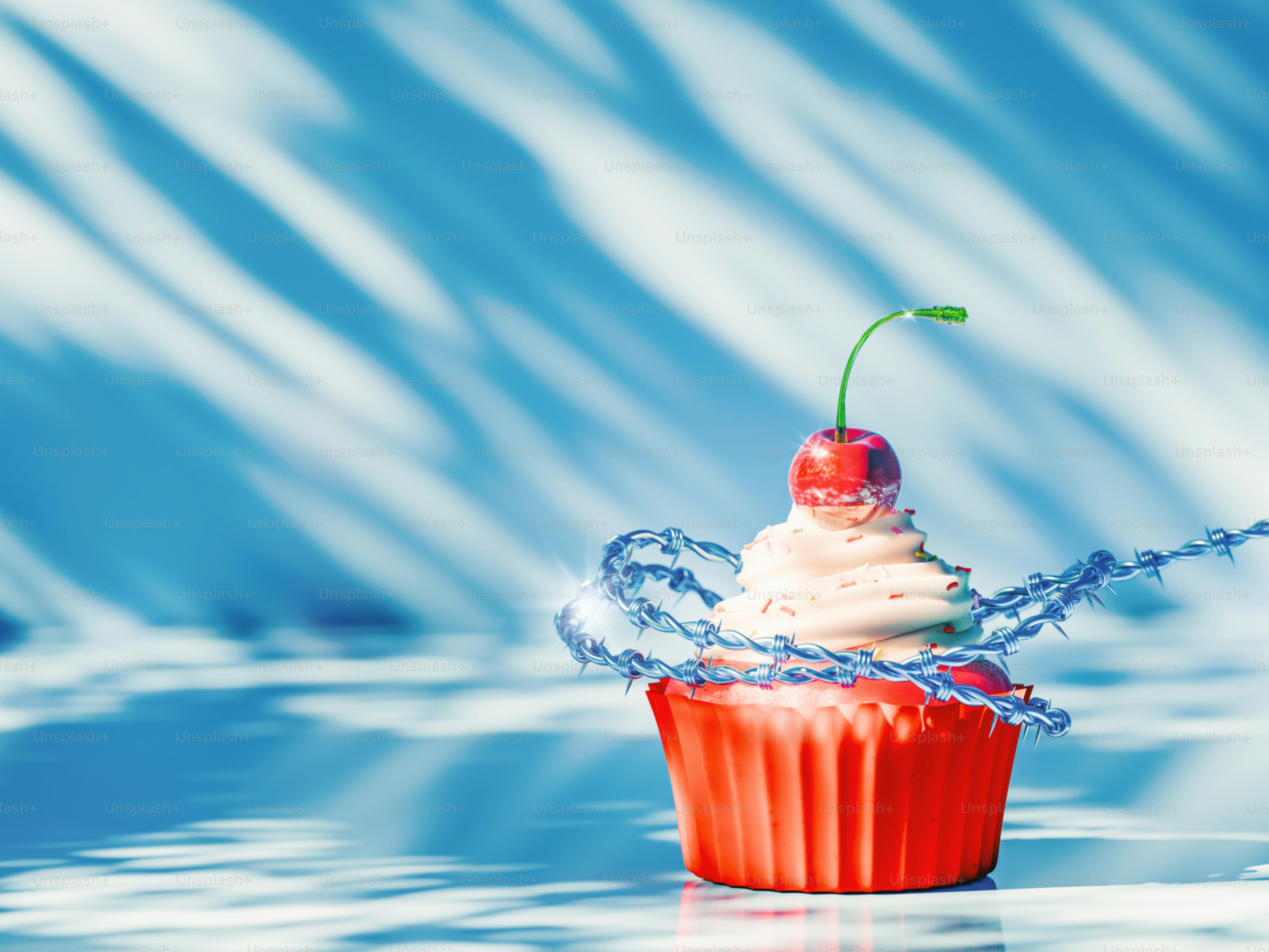 さくらんぼをのせたカップケーキ