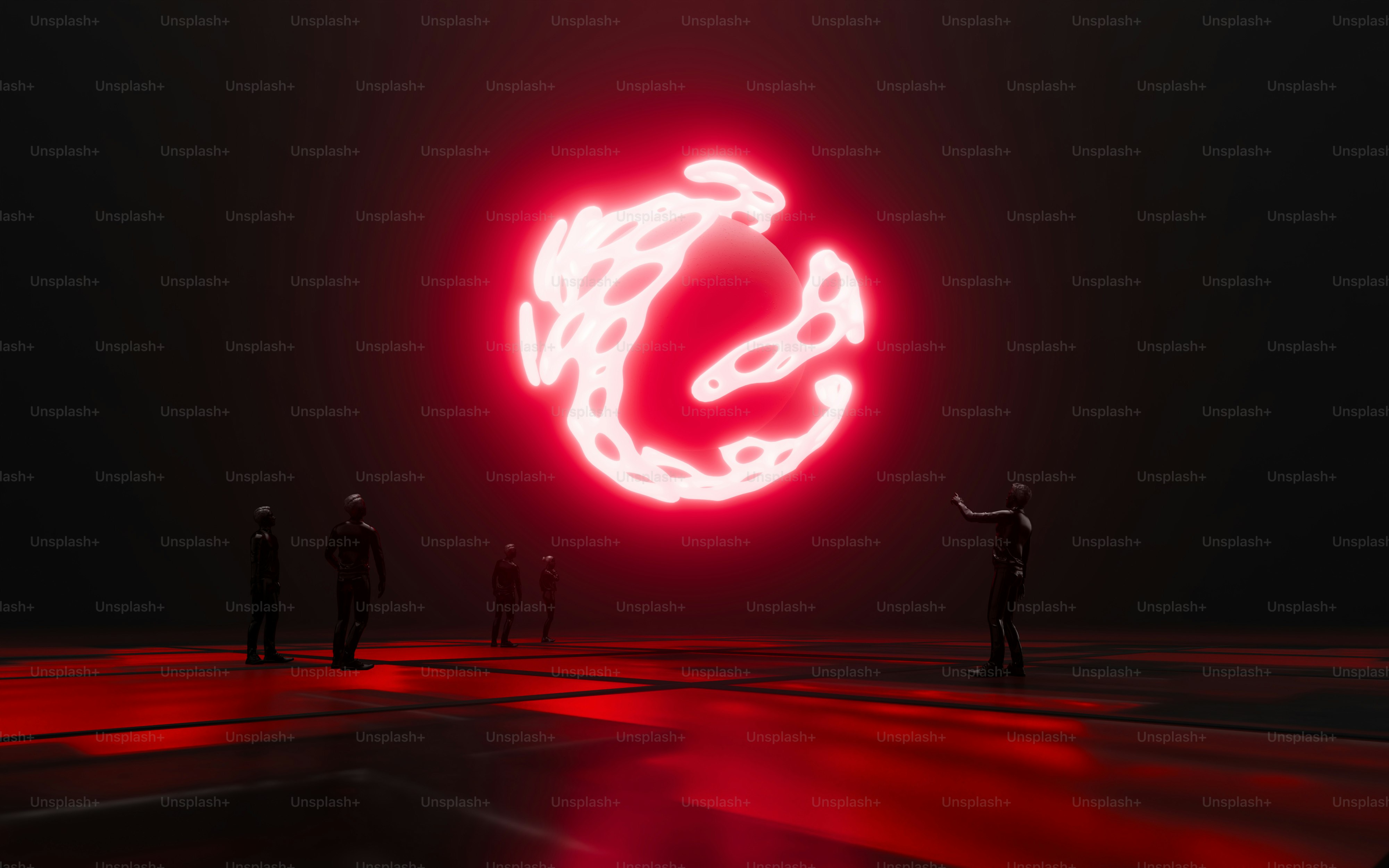 A group of people standing in front of a red light