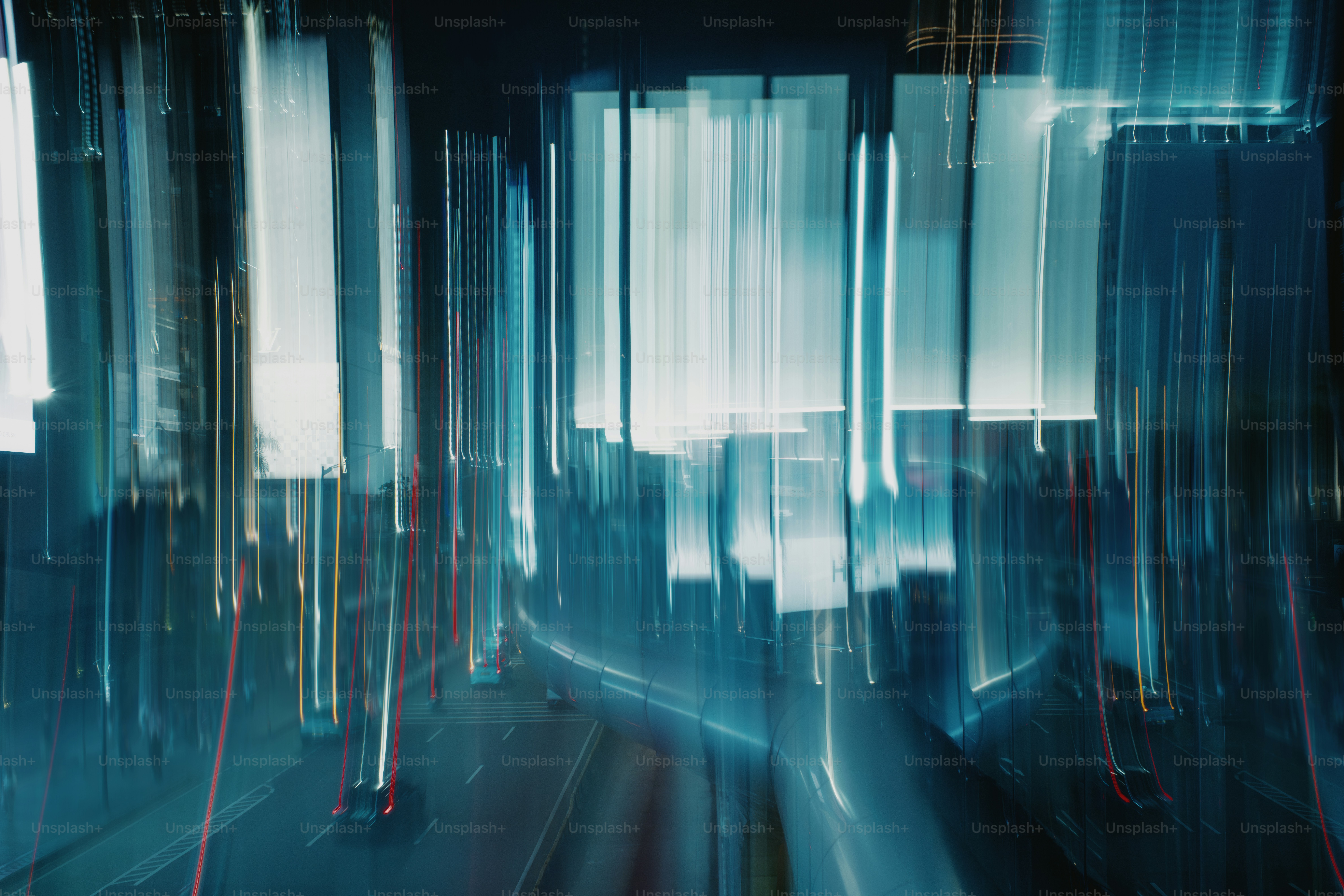 A blurry photo of a city street at night