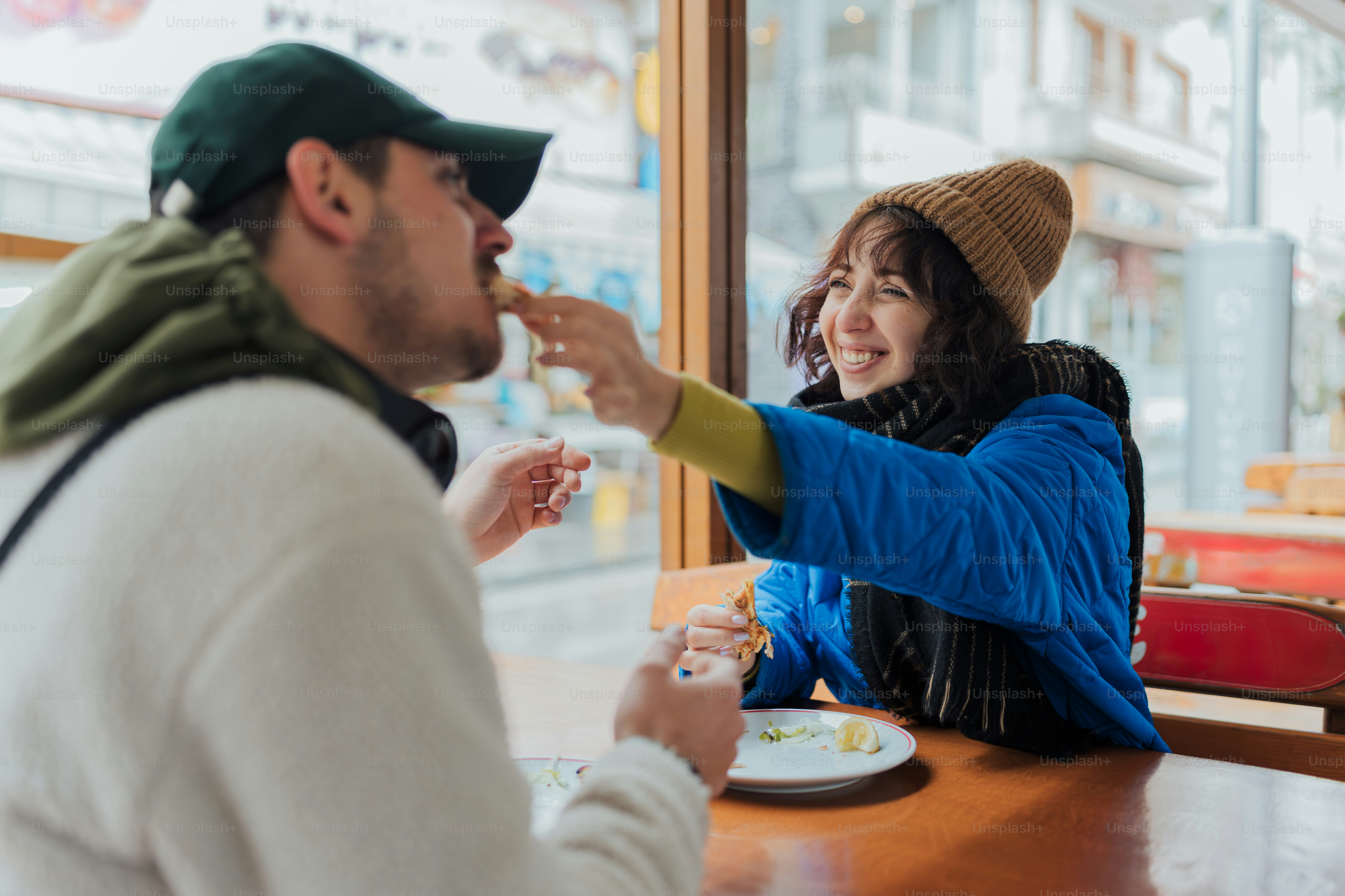 A man and a woman sitting at a table