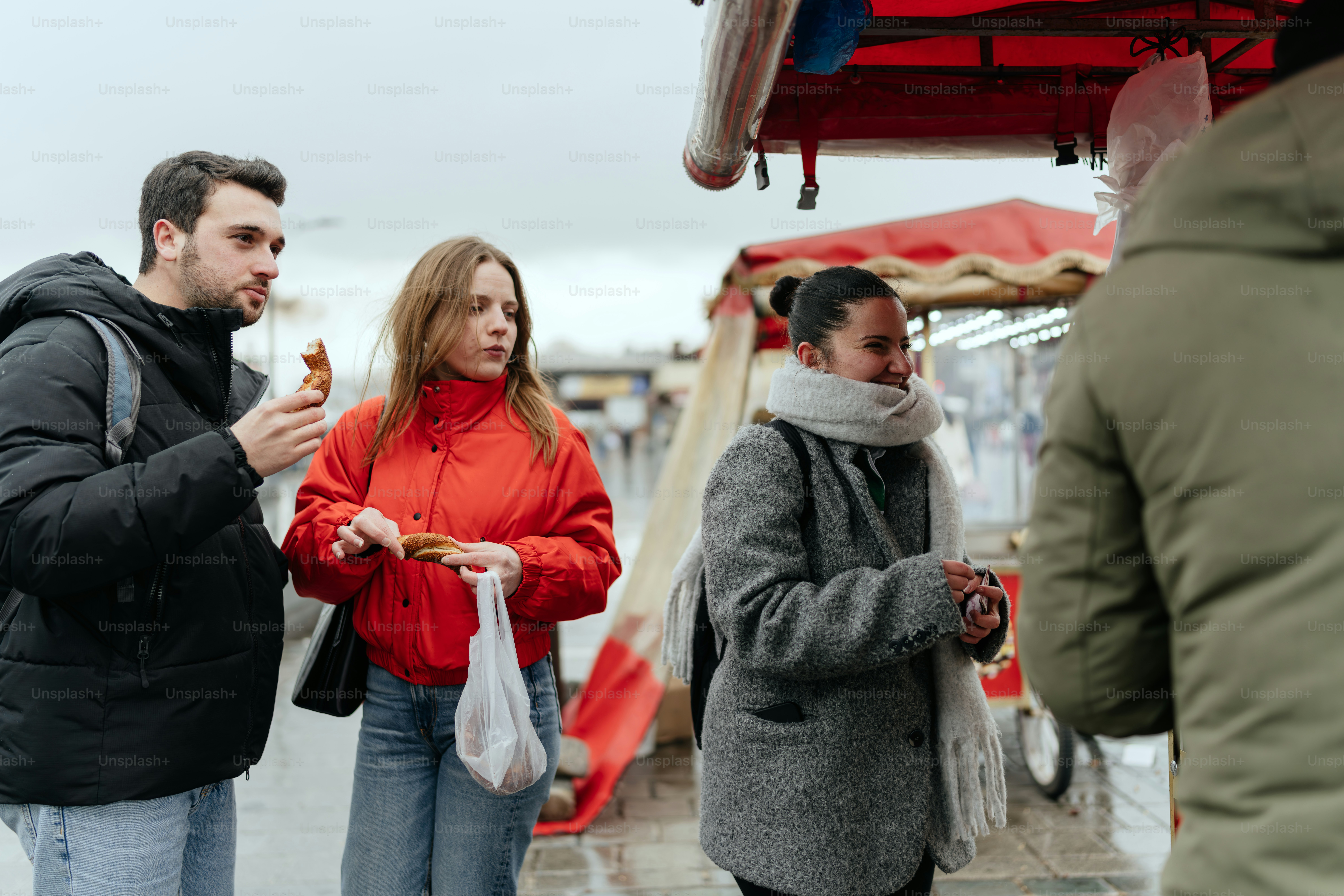 A group of people standing next to each other