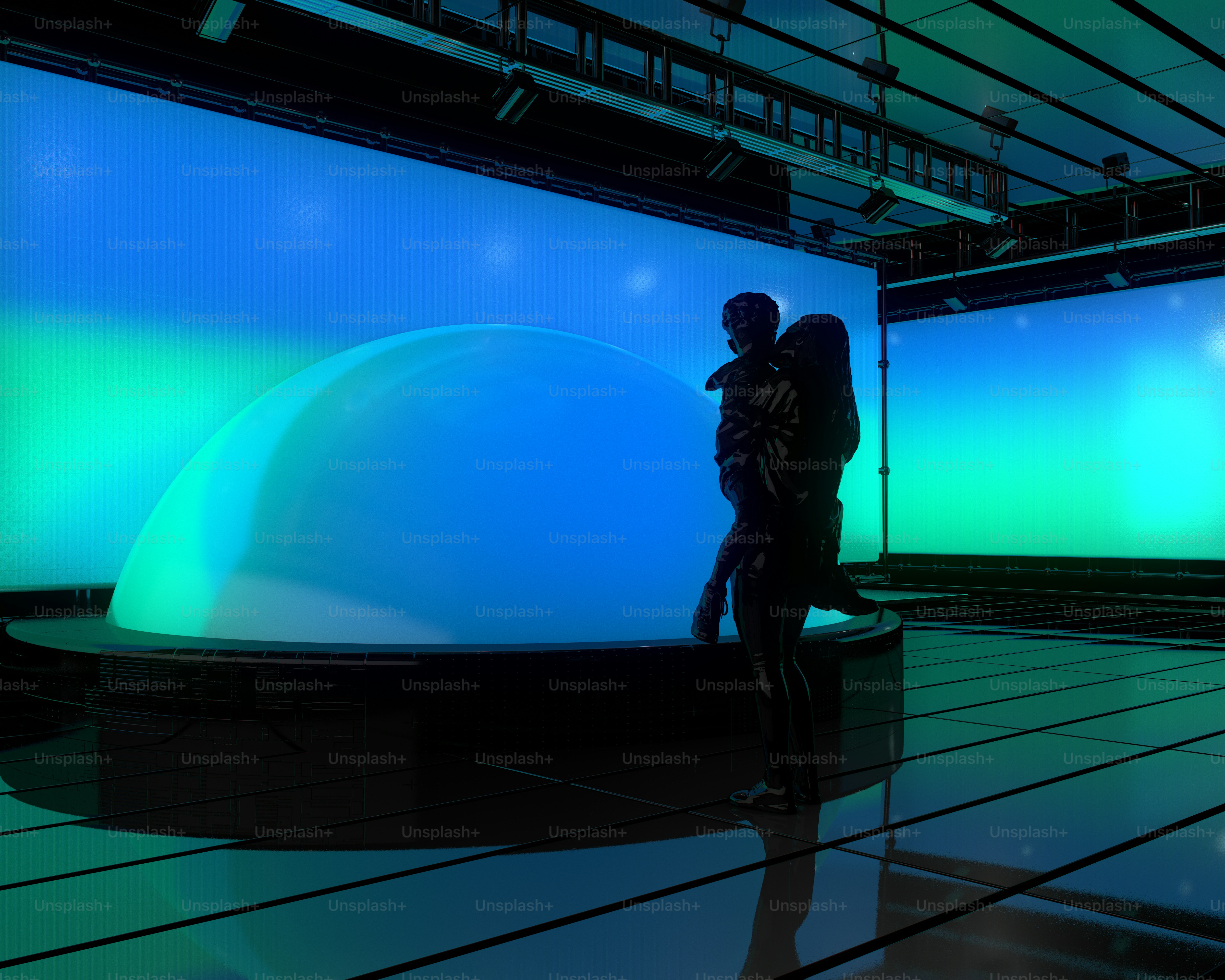 A couple of people that are standing in front of a wall