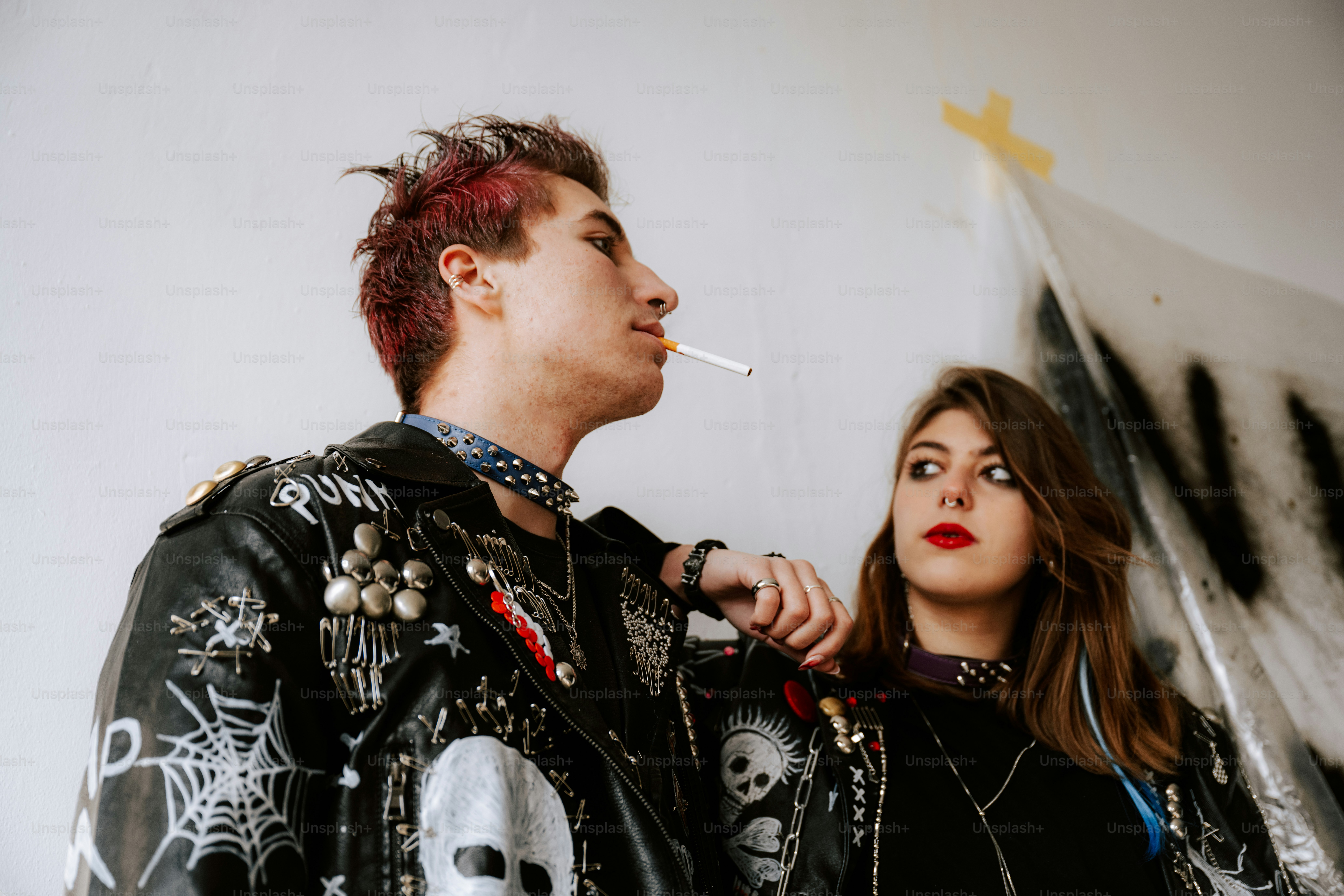 A man and a woman standing next to each other