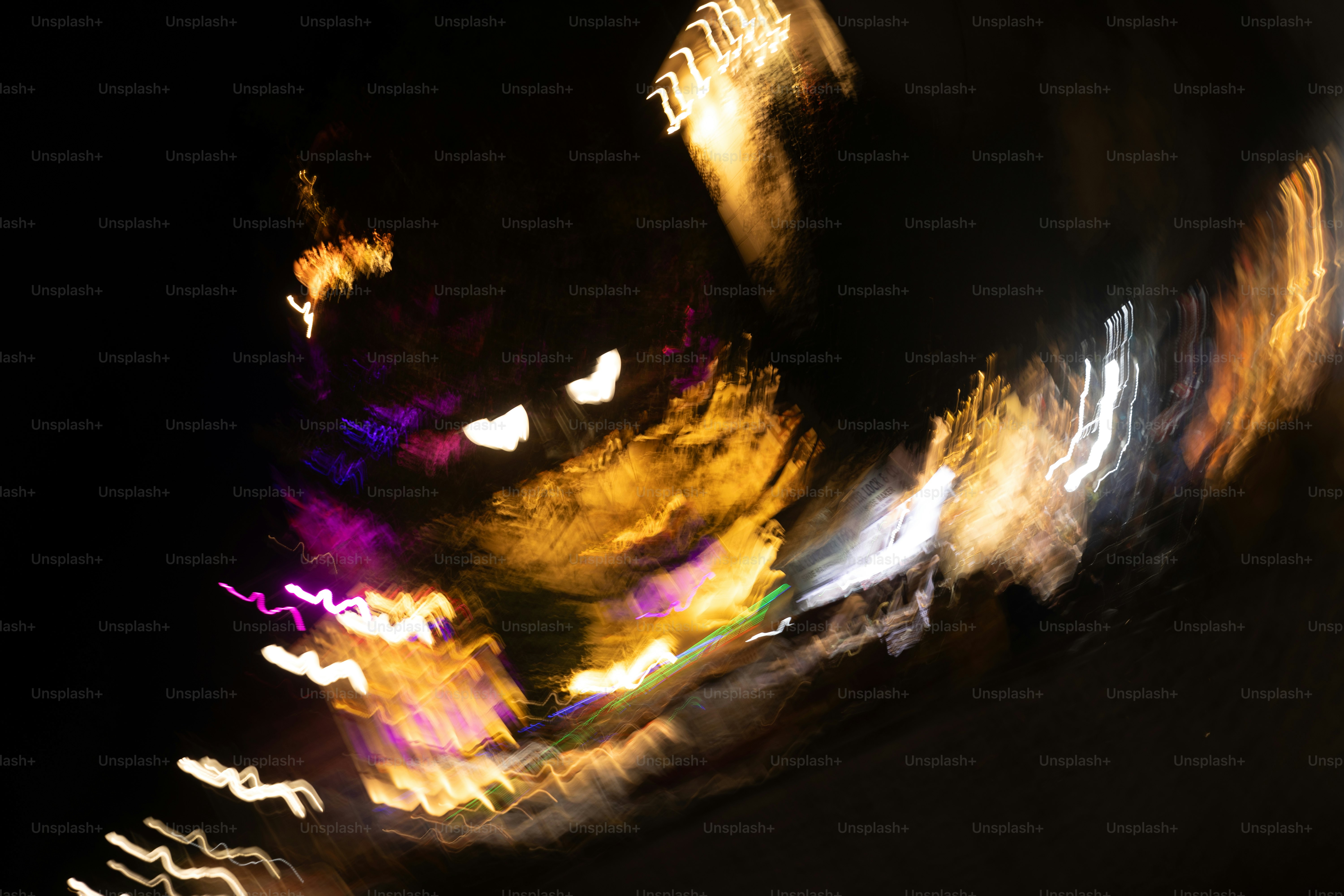 A blurry photo of a city street at night