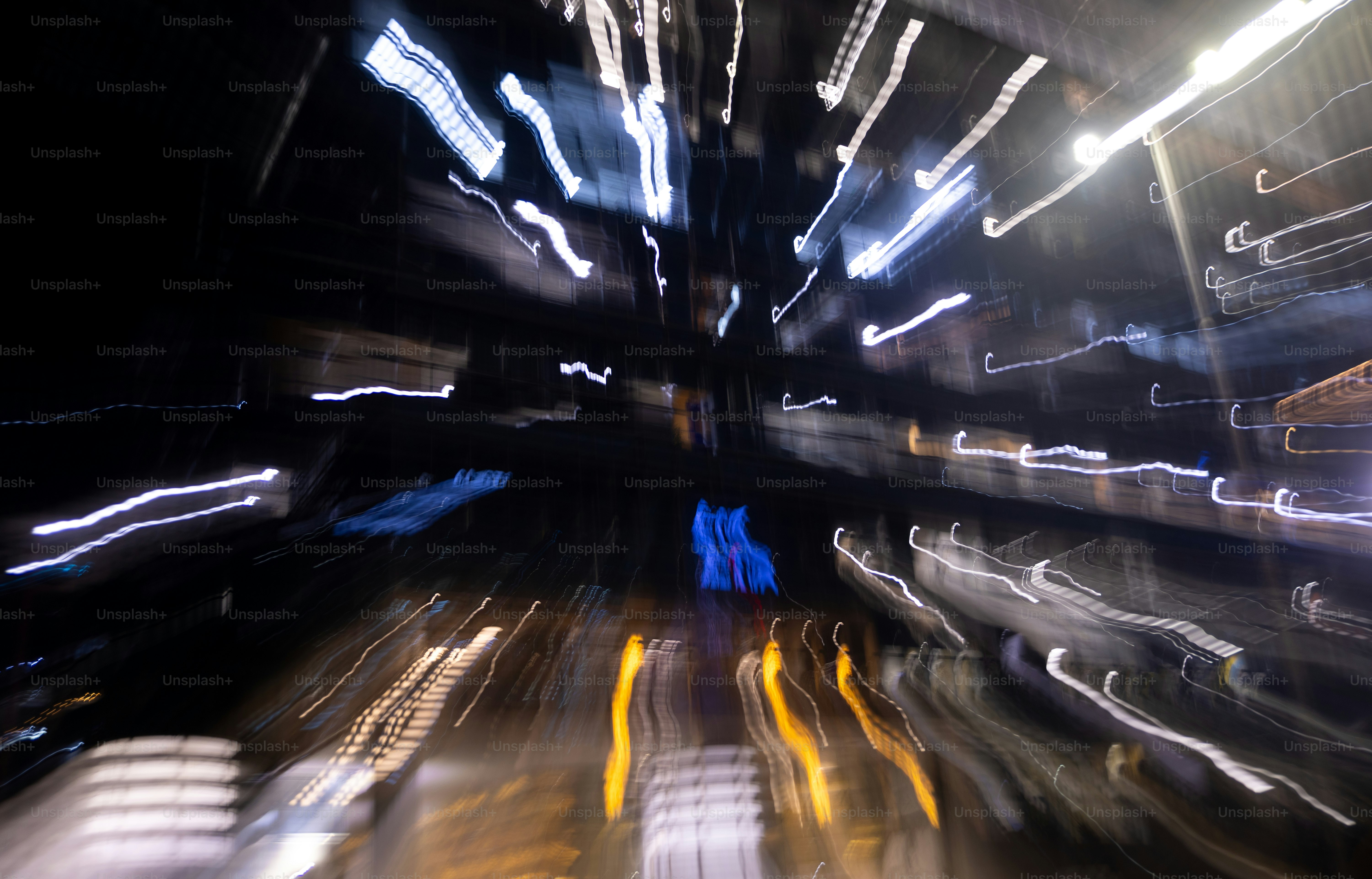 A blurry photo of a tunnel with lights