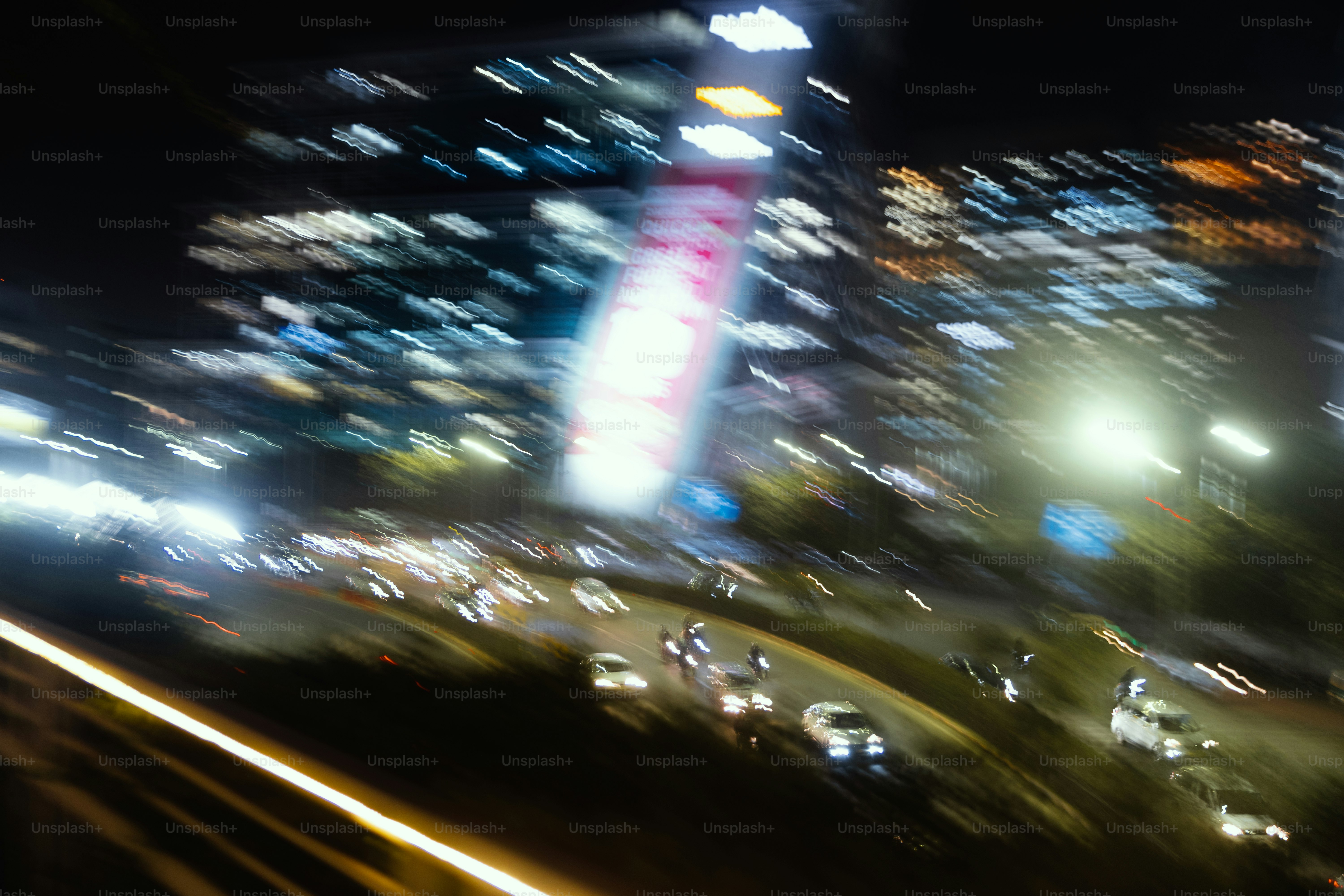 A blurry photo of a city at night
