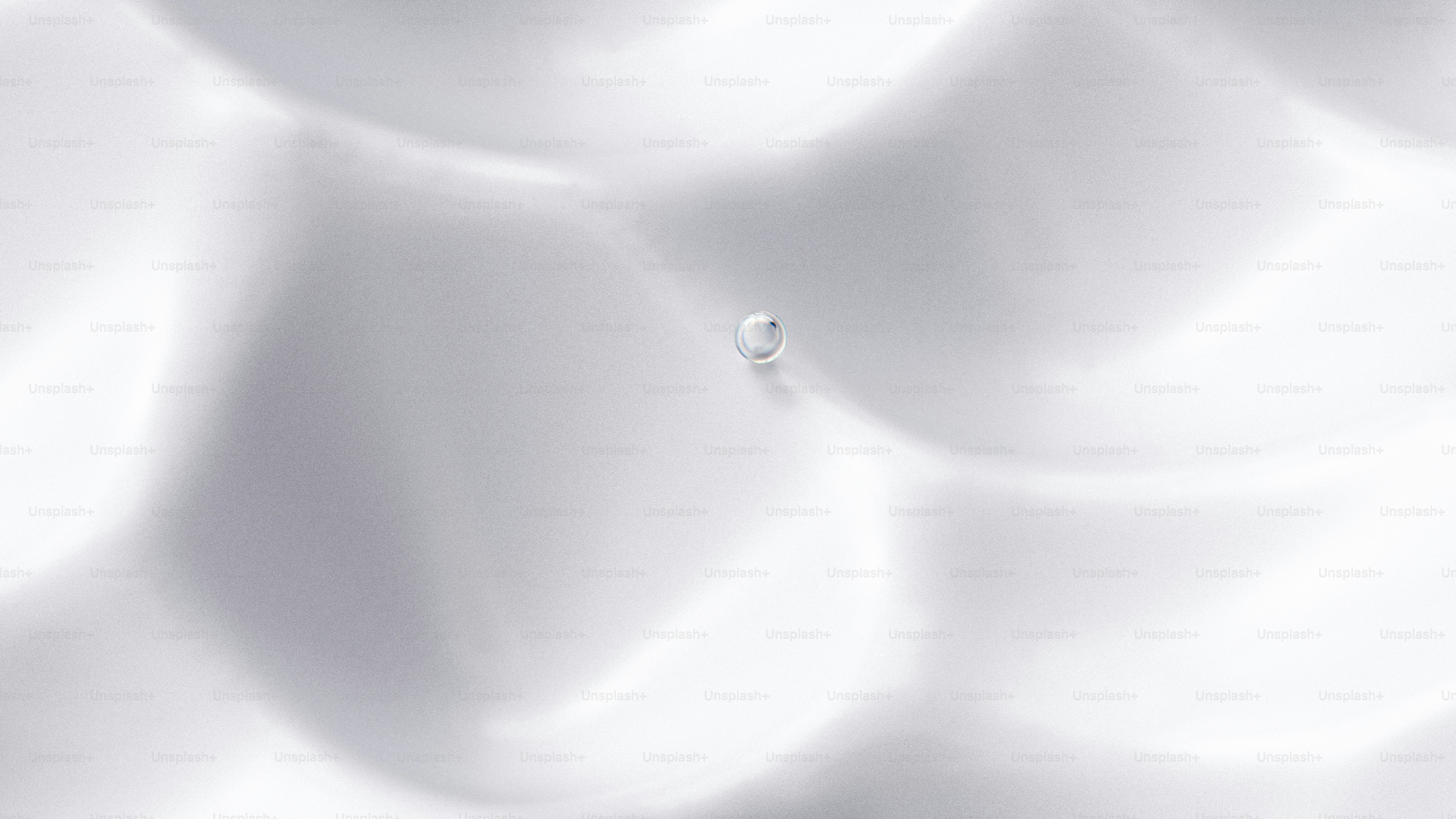 A drop of water on a white surface
