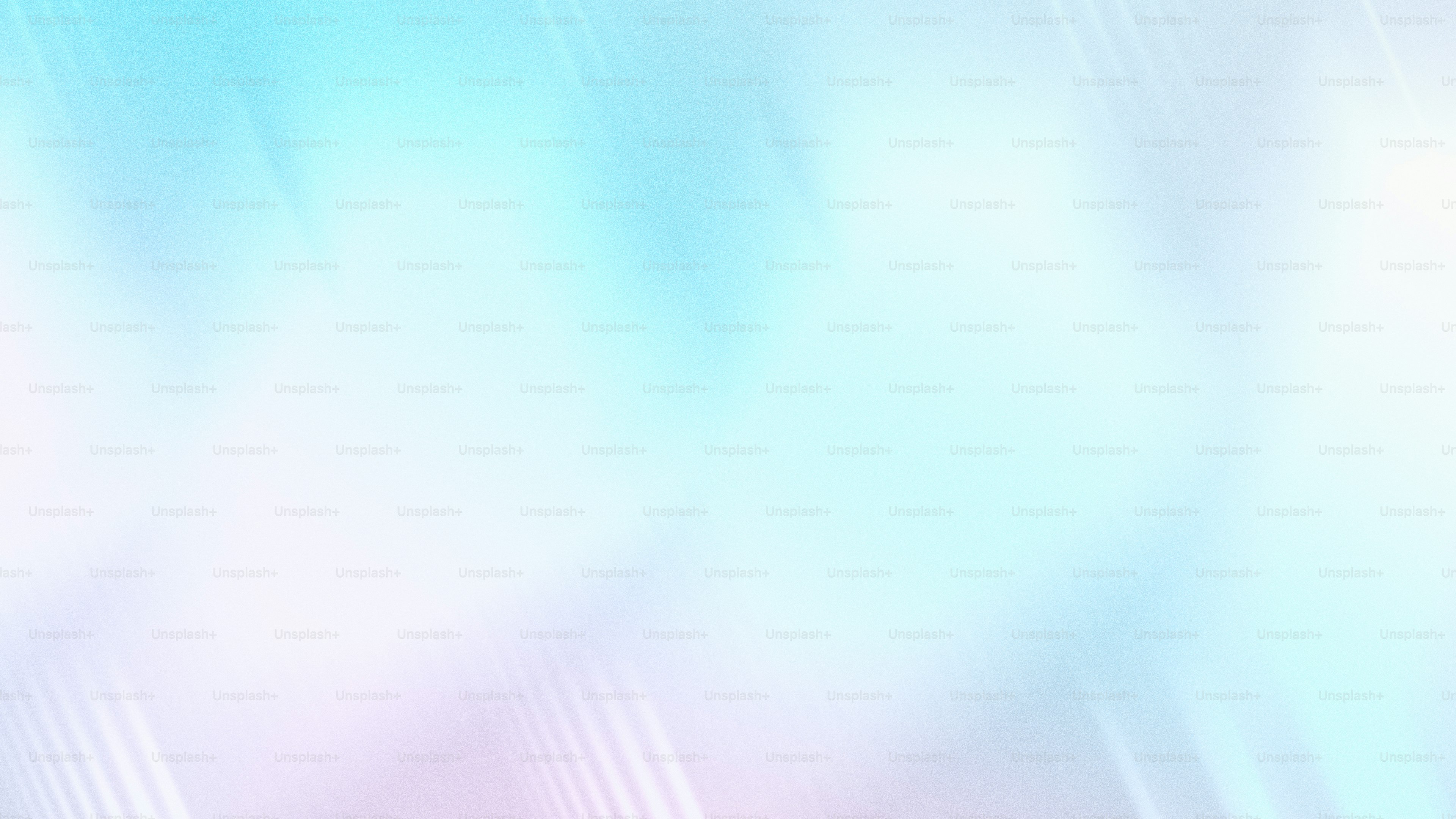 A blurry image of a blue and pink background