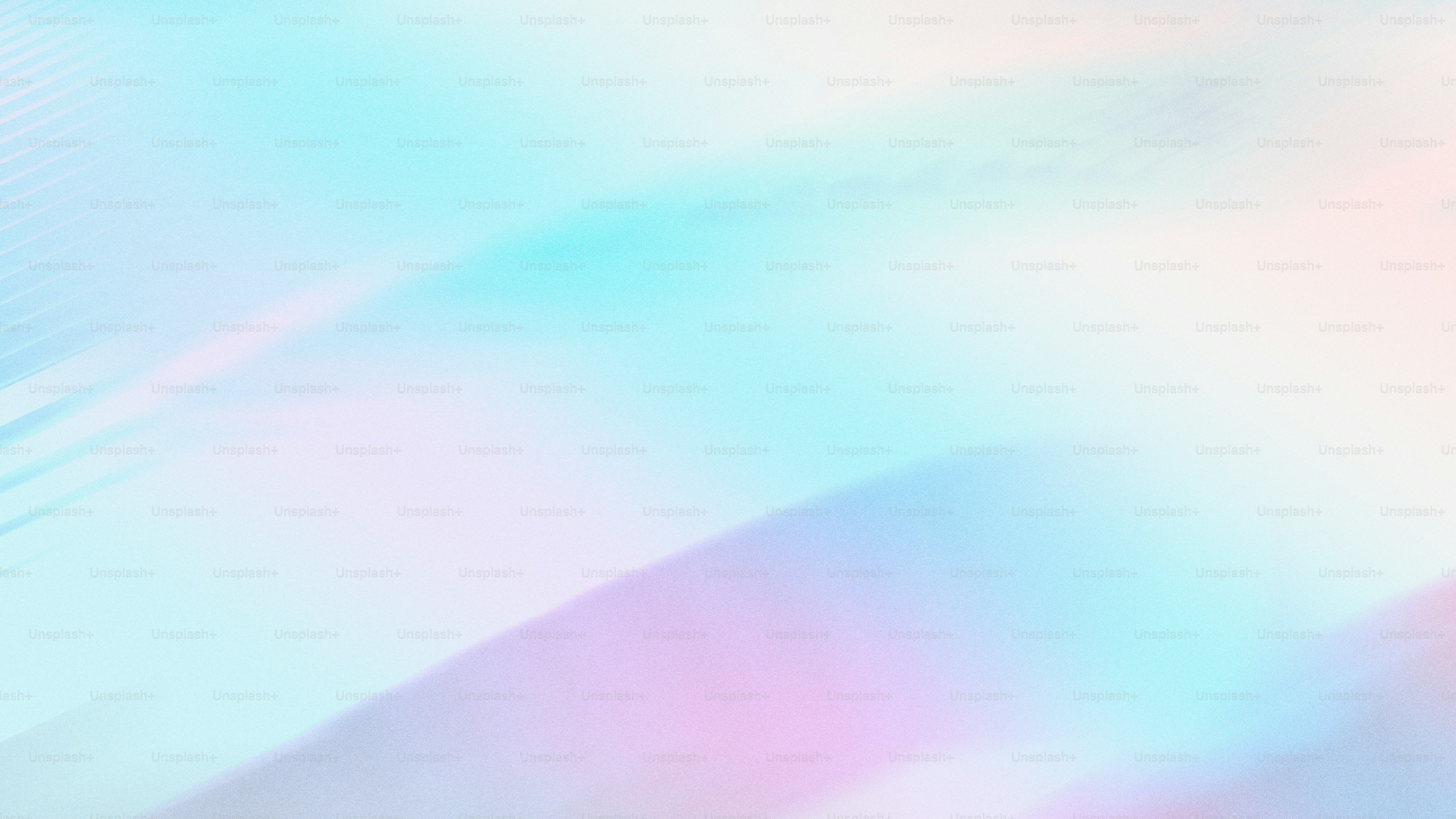 A blurry image of a blue and pink background