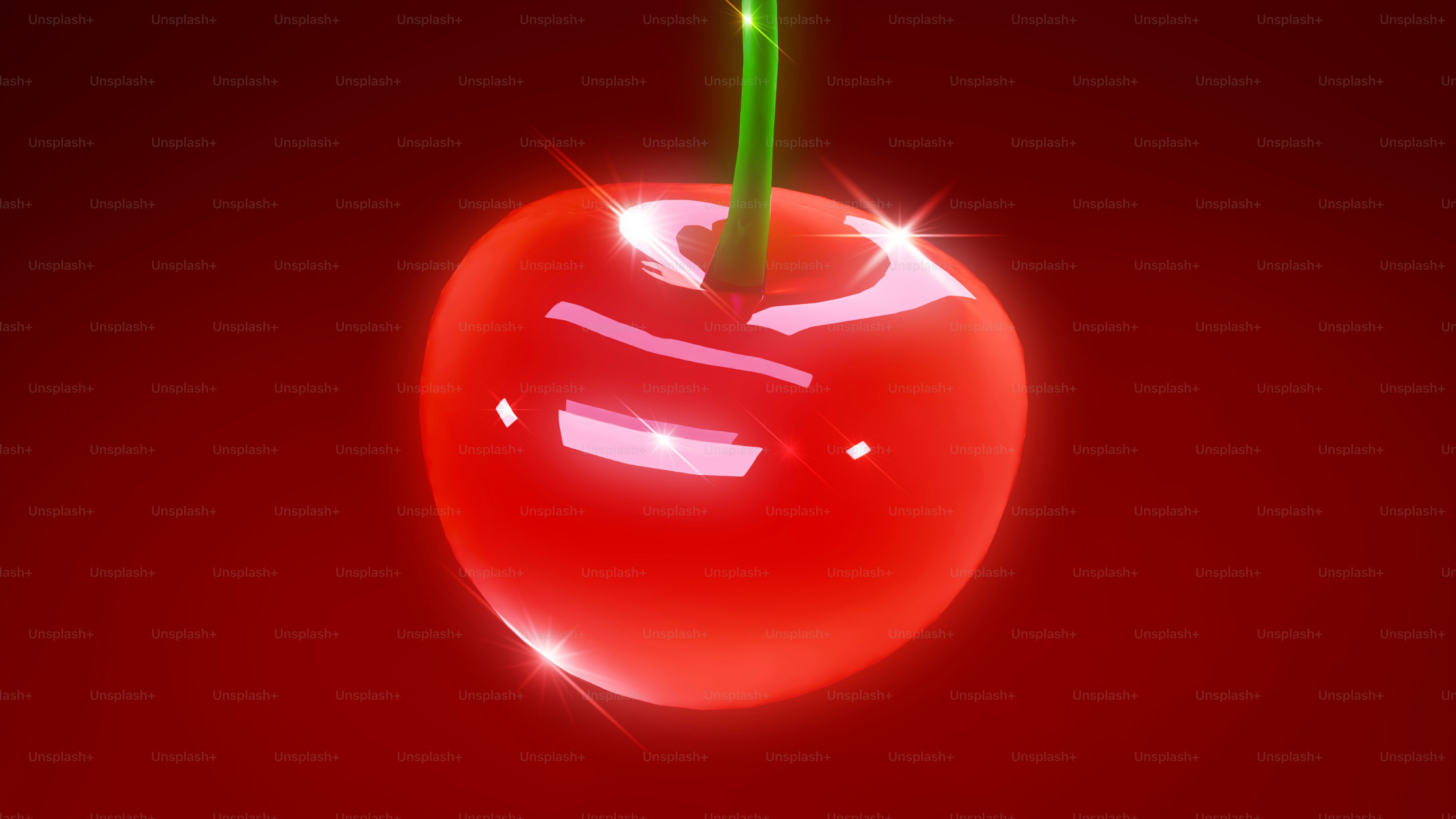 A red apple with a green stem on a red background