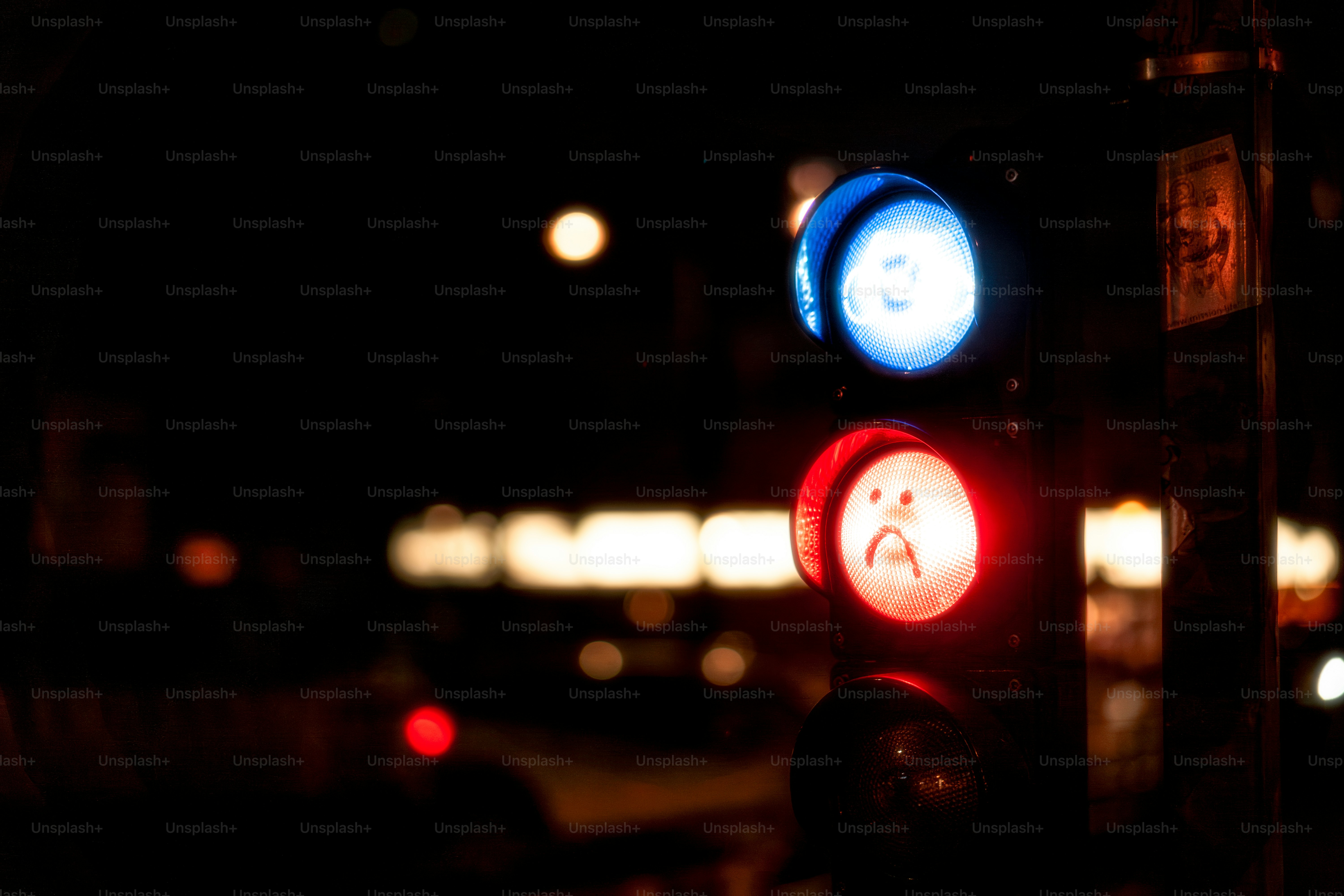 A traffic light sitting on the side of a road