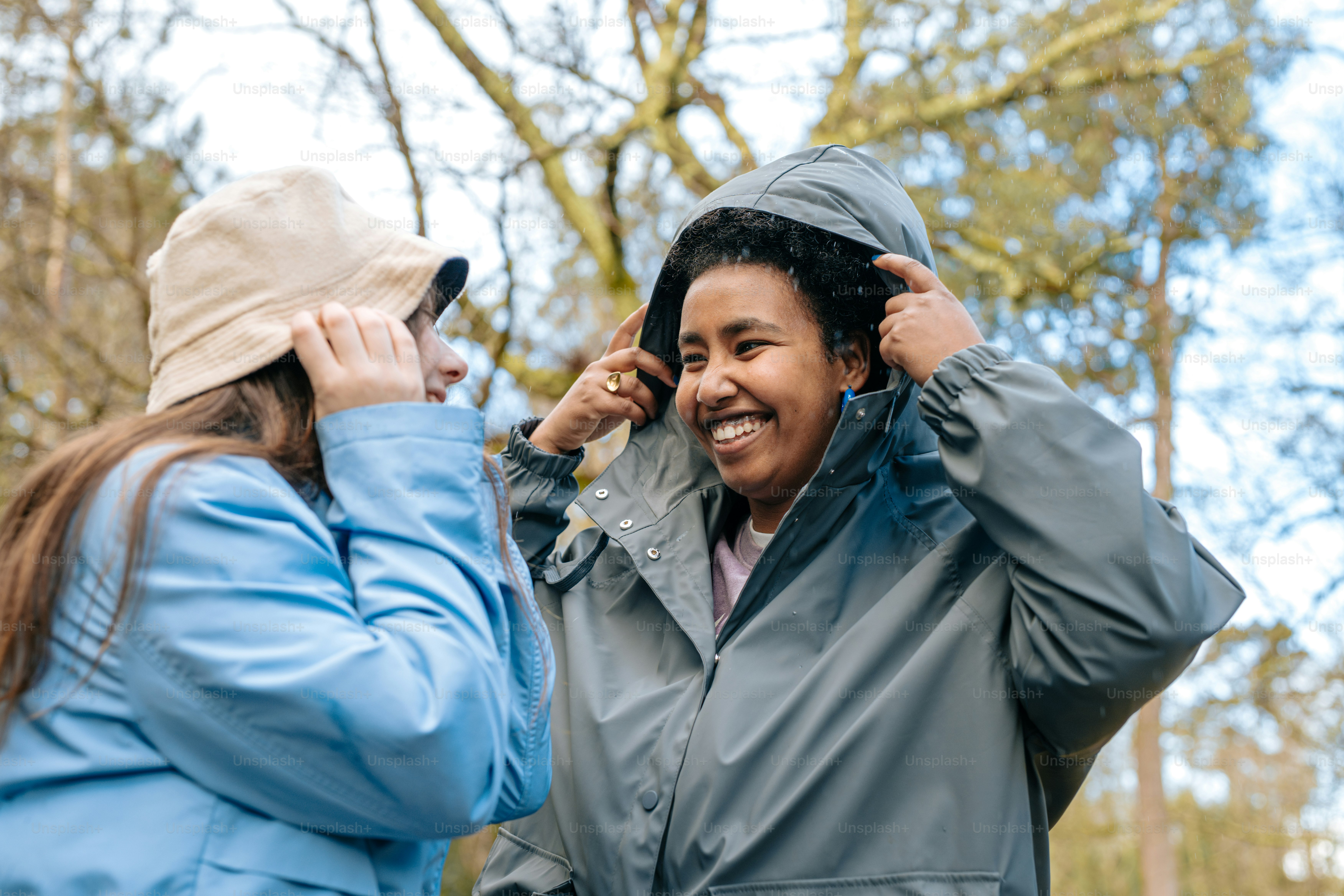 A couple of women standing next to each other