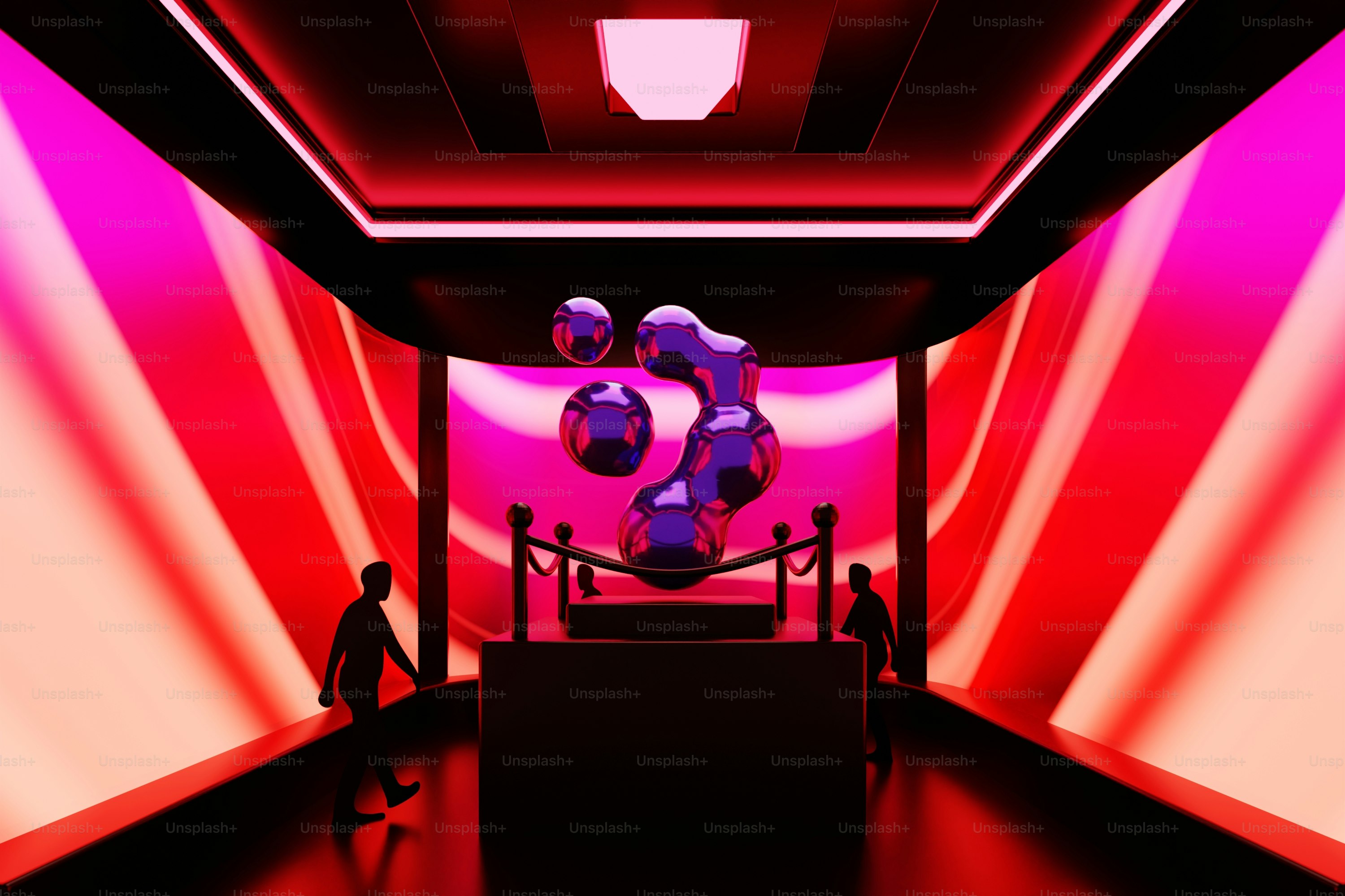 A red and purple room with a sculpture in the center