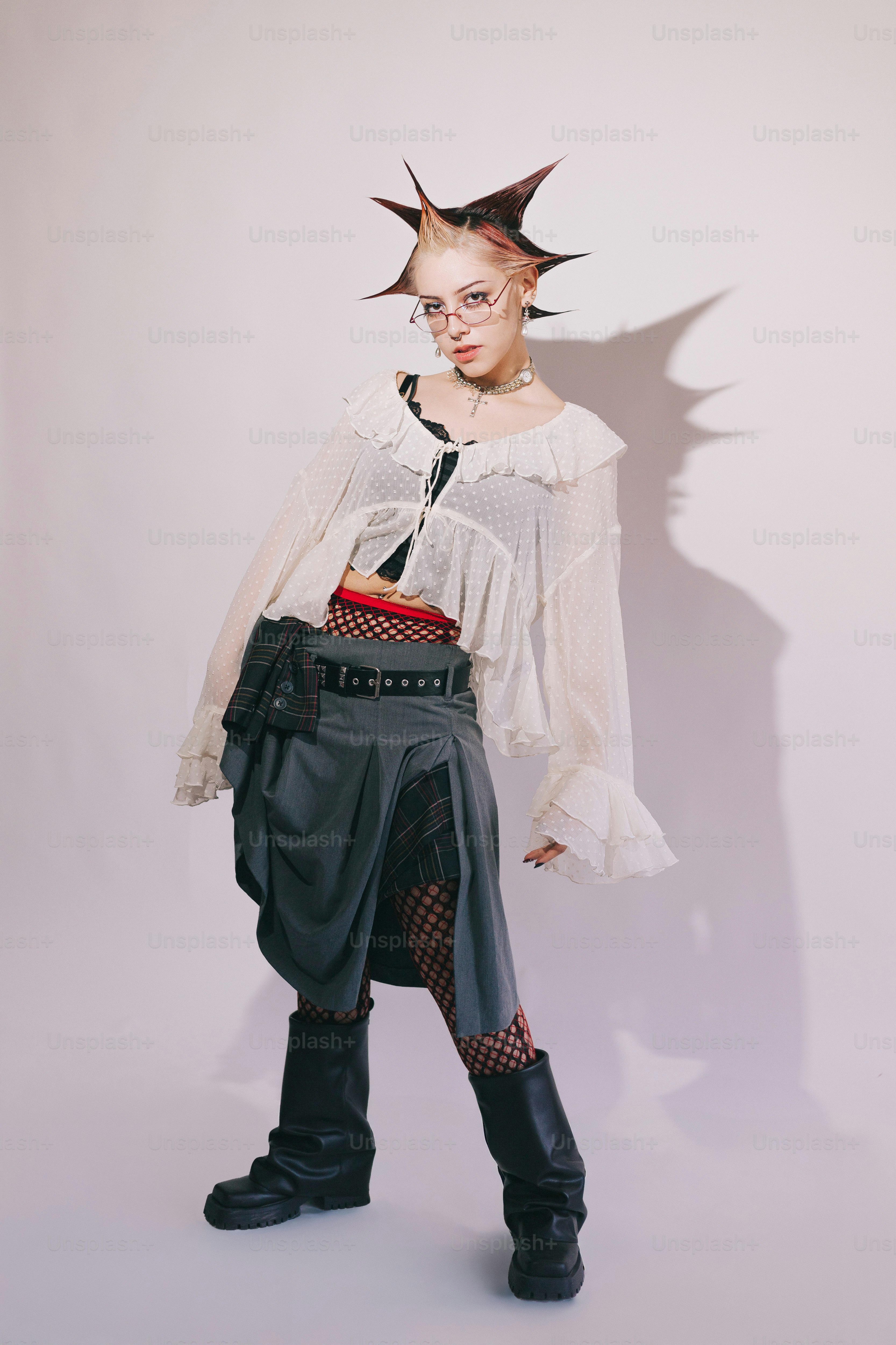 A woman in a costume with spikes on her head