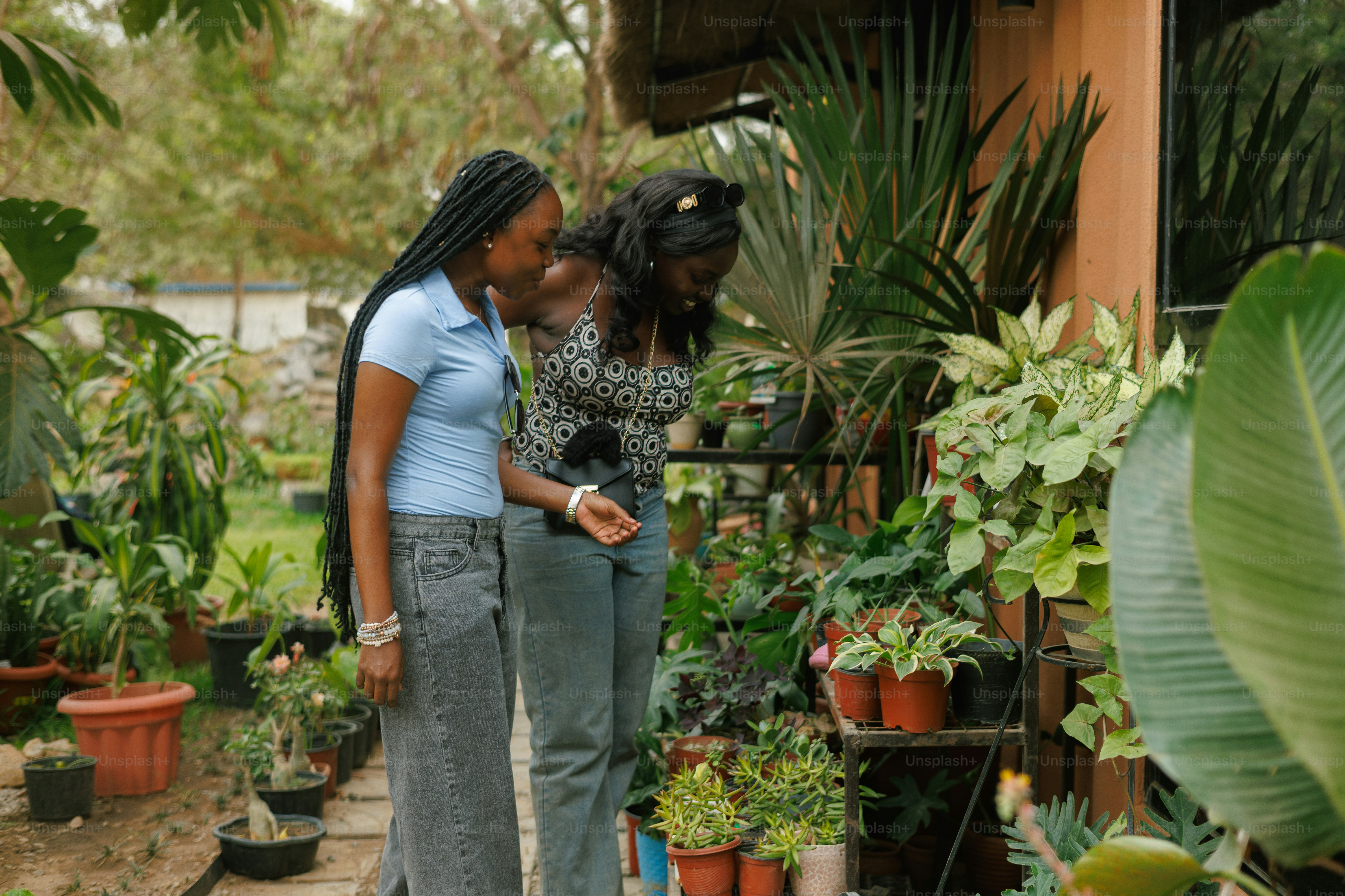 A couple of women standing next to each other