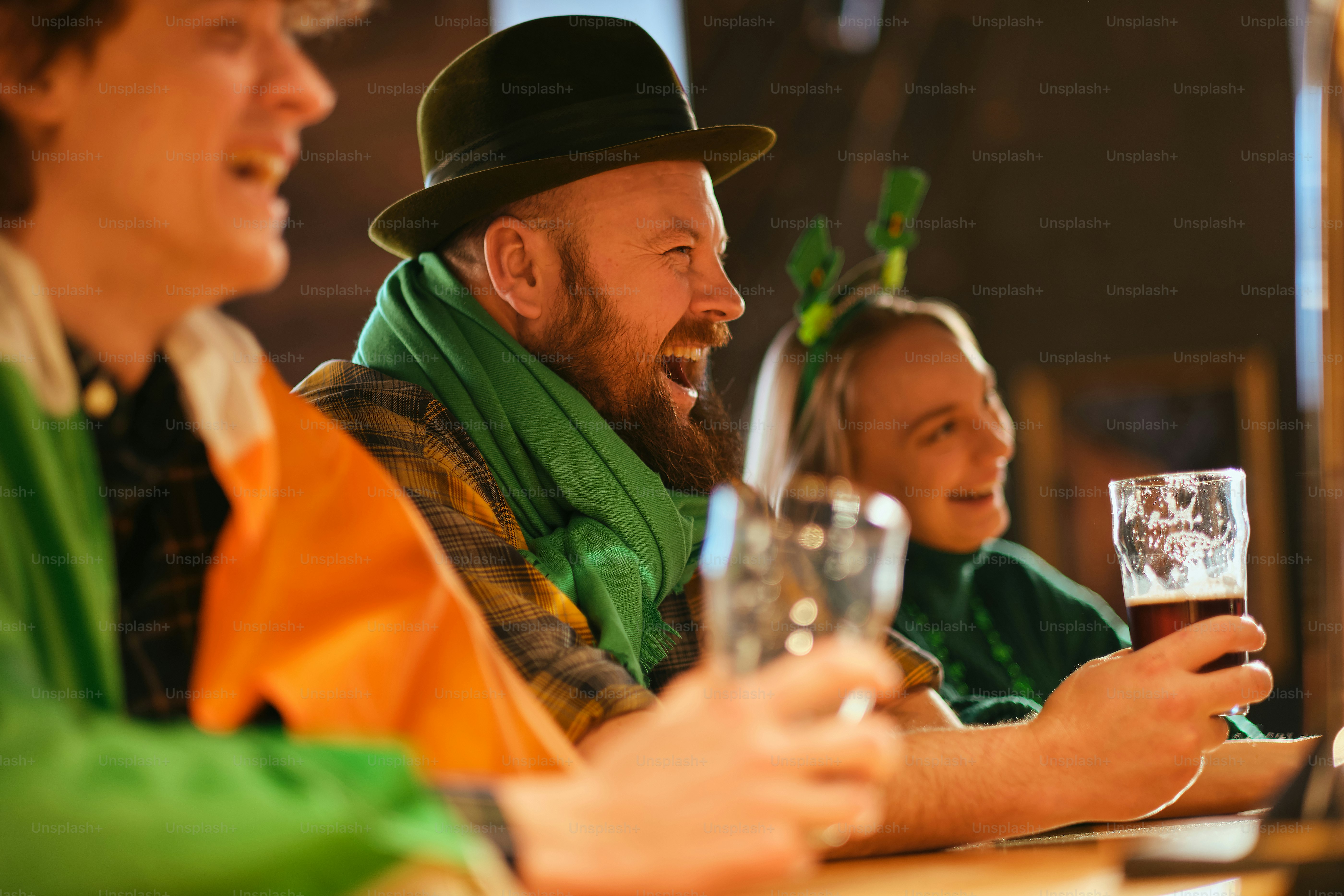 A group of people sitting at a table with wine glasses