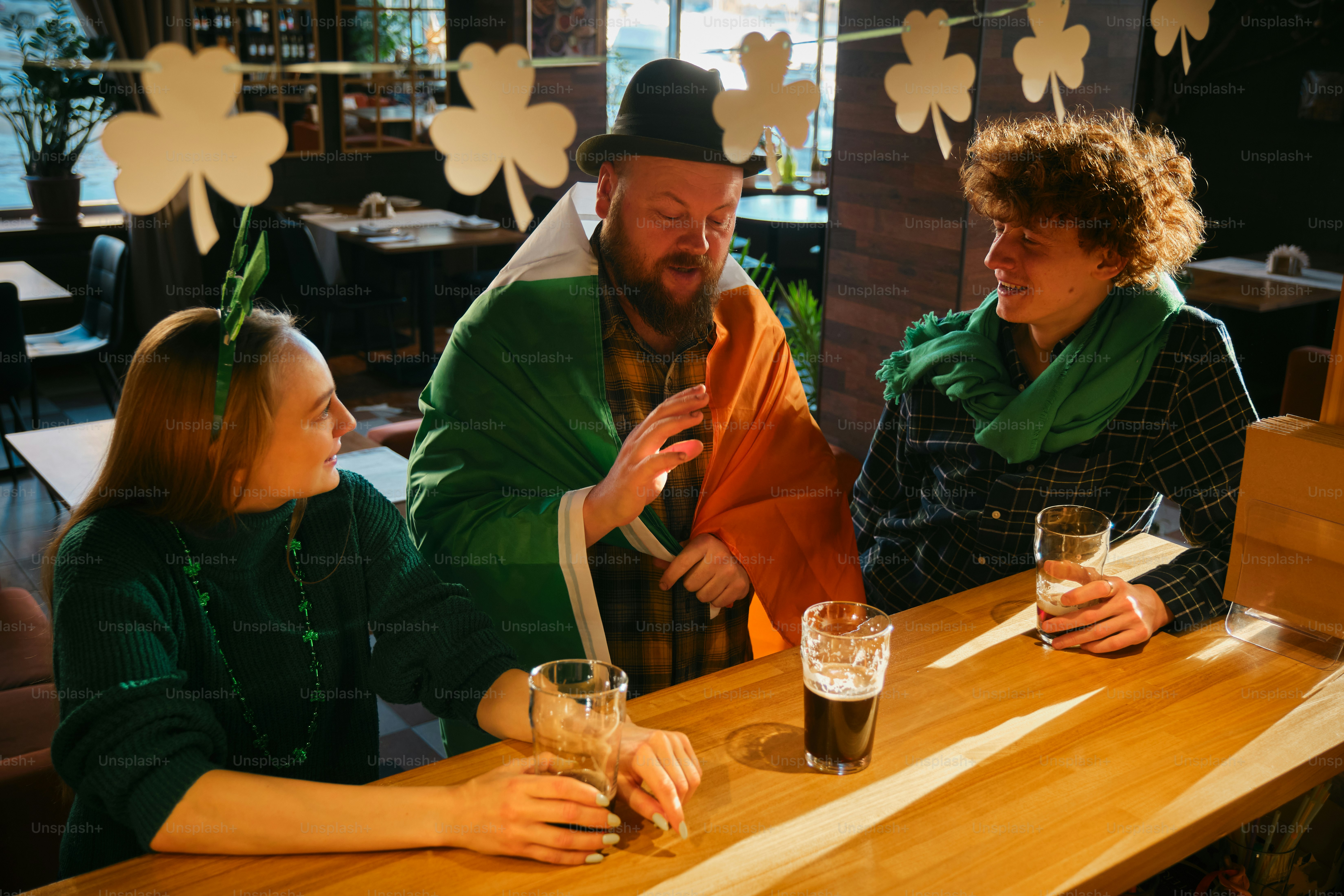 A group of people sitting at a bar