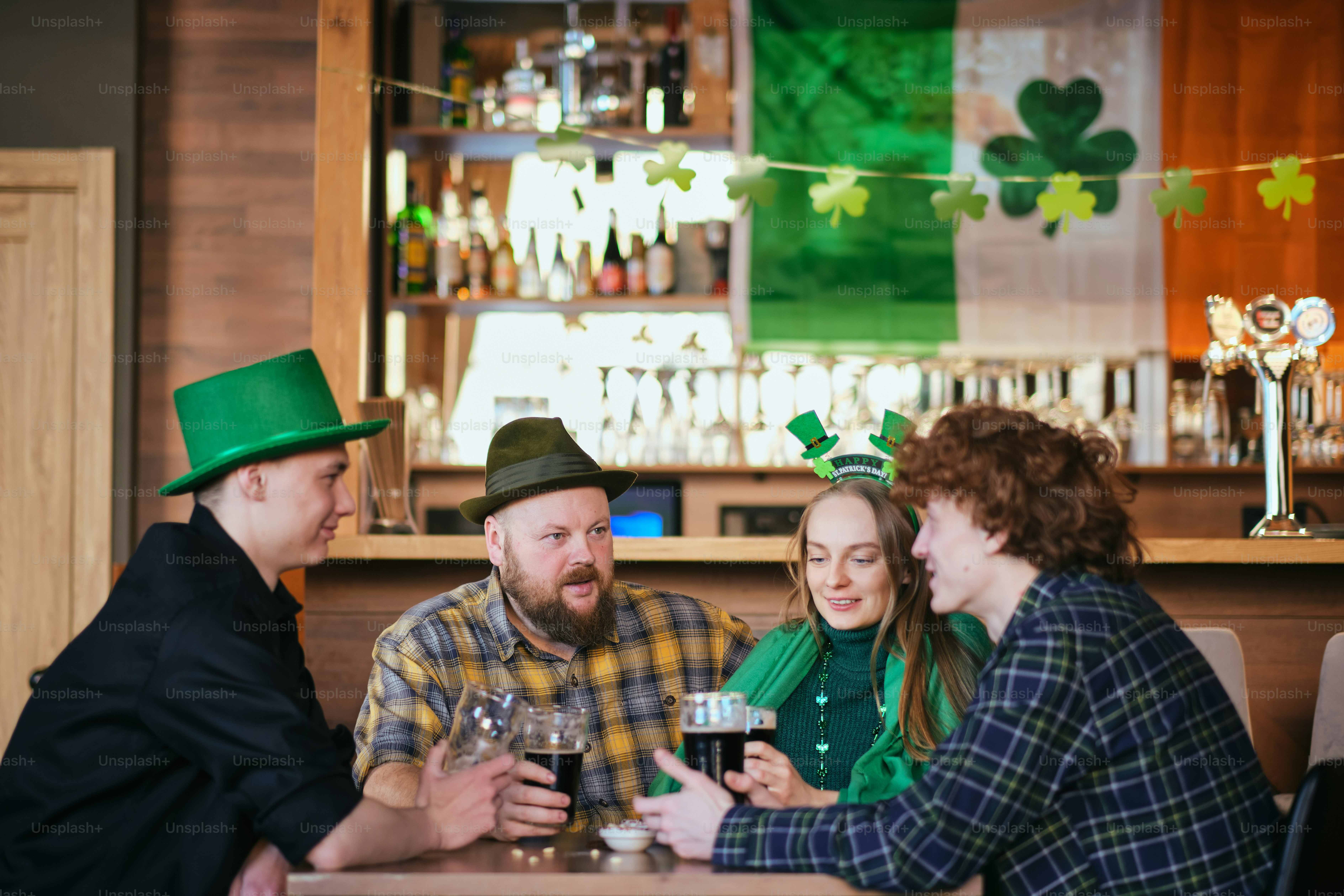 A group of people sitting at a table drinking wine