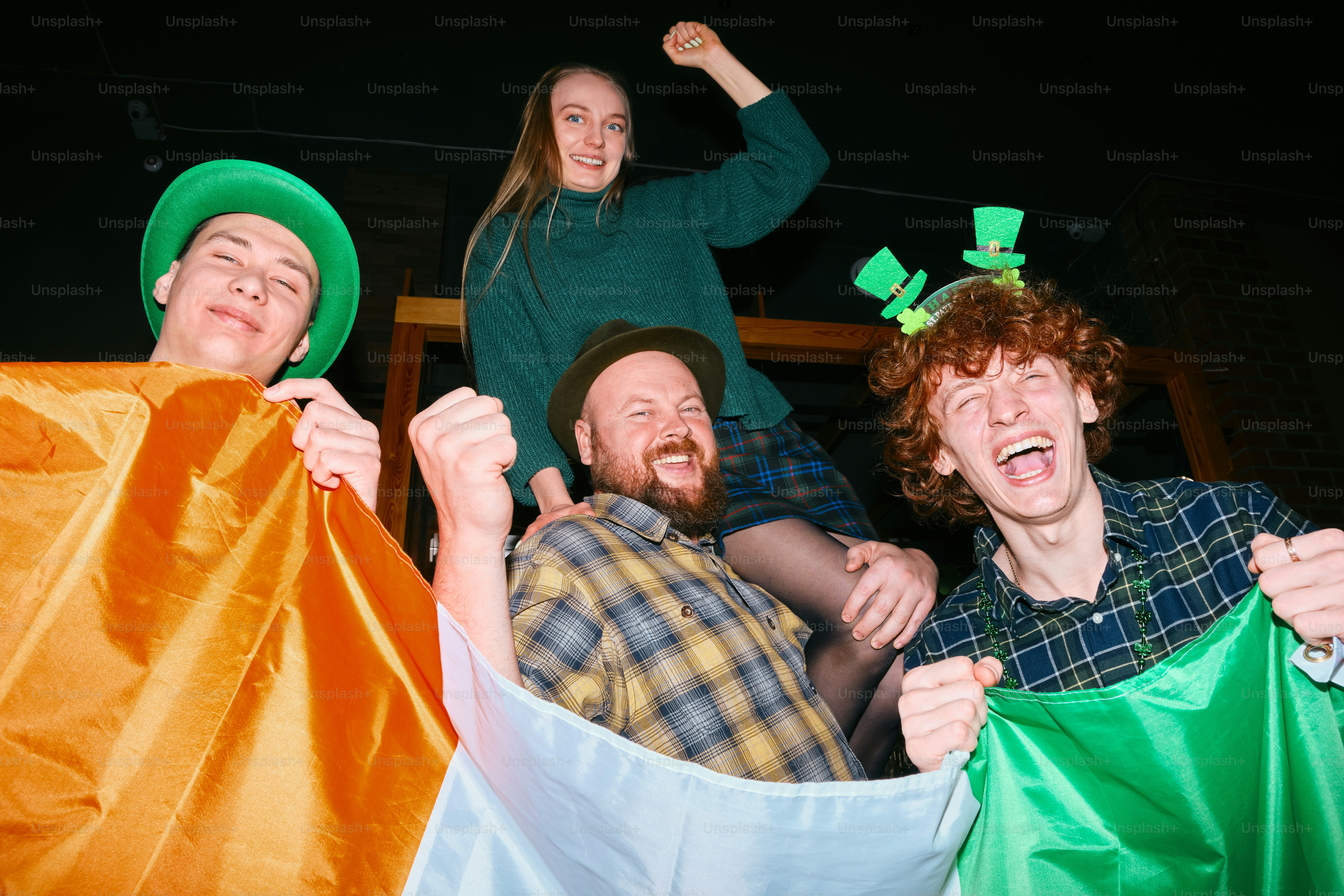 A group of people standing around each other