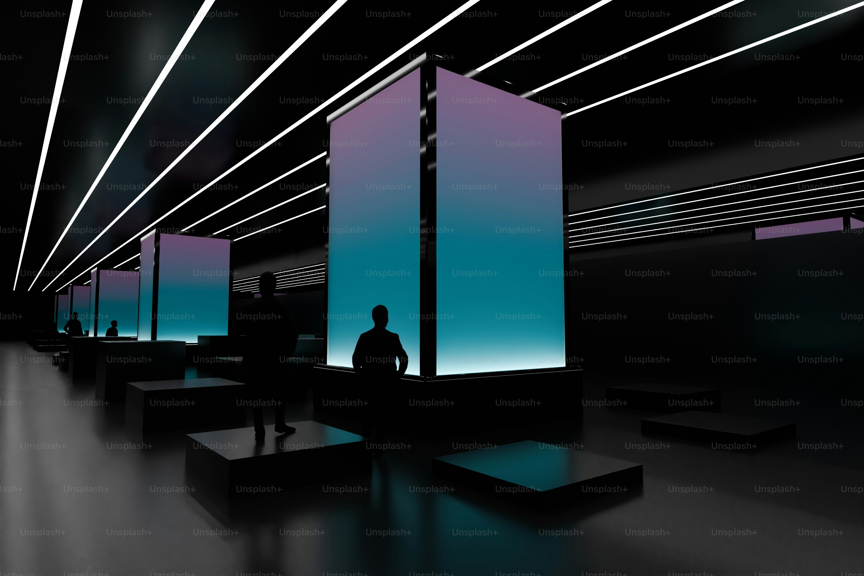 A man is standing in a dark room