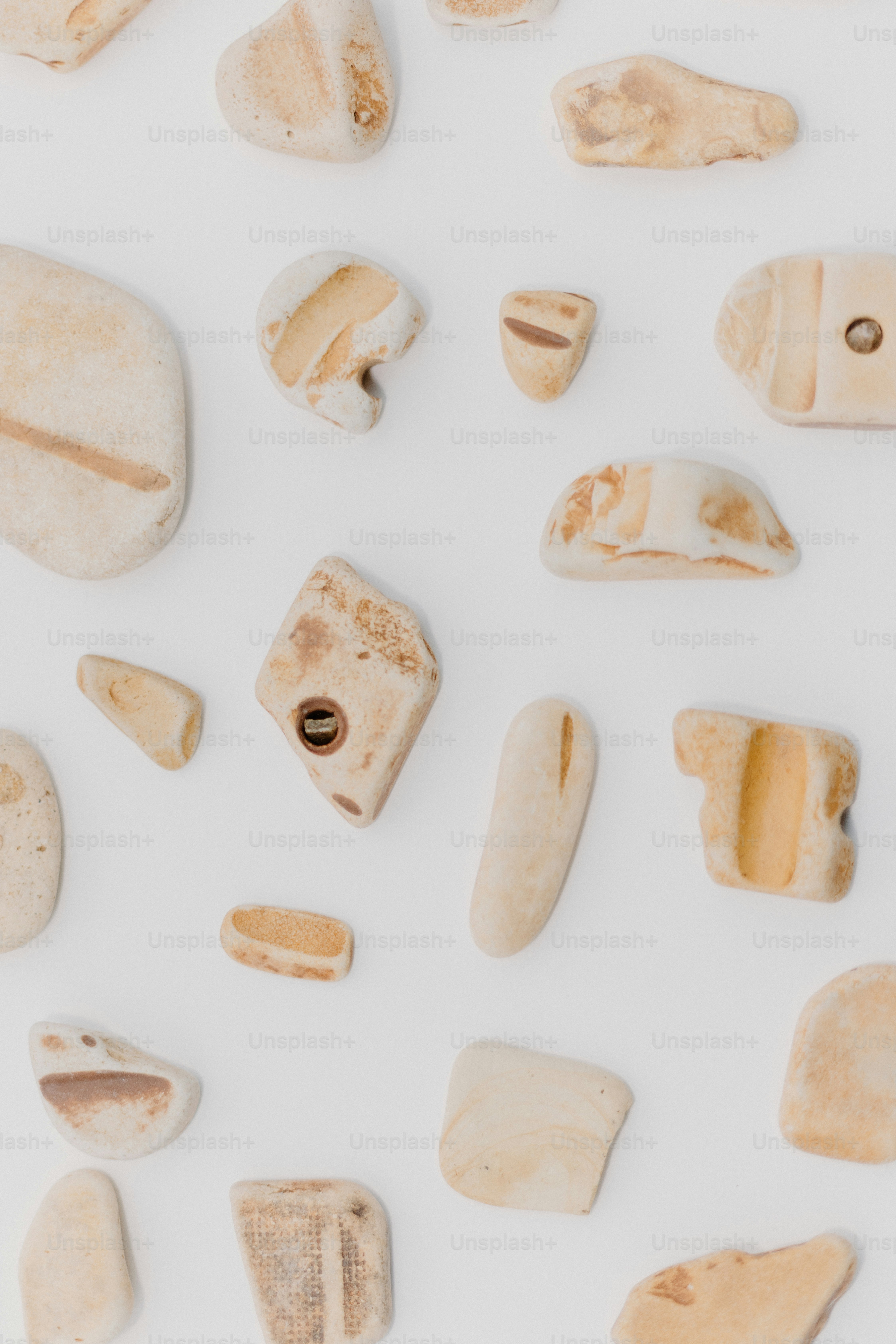 A group of rocks sitting on top of a white surface