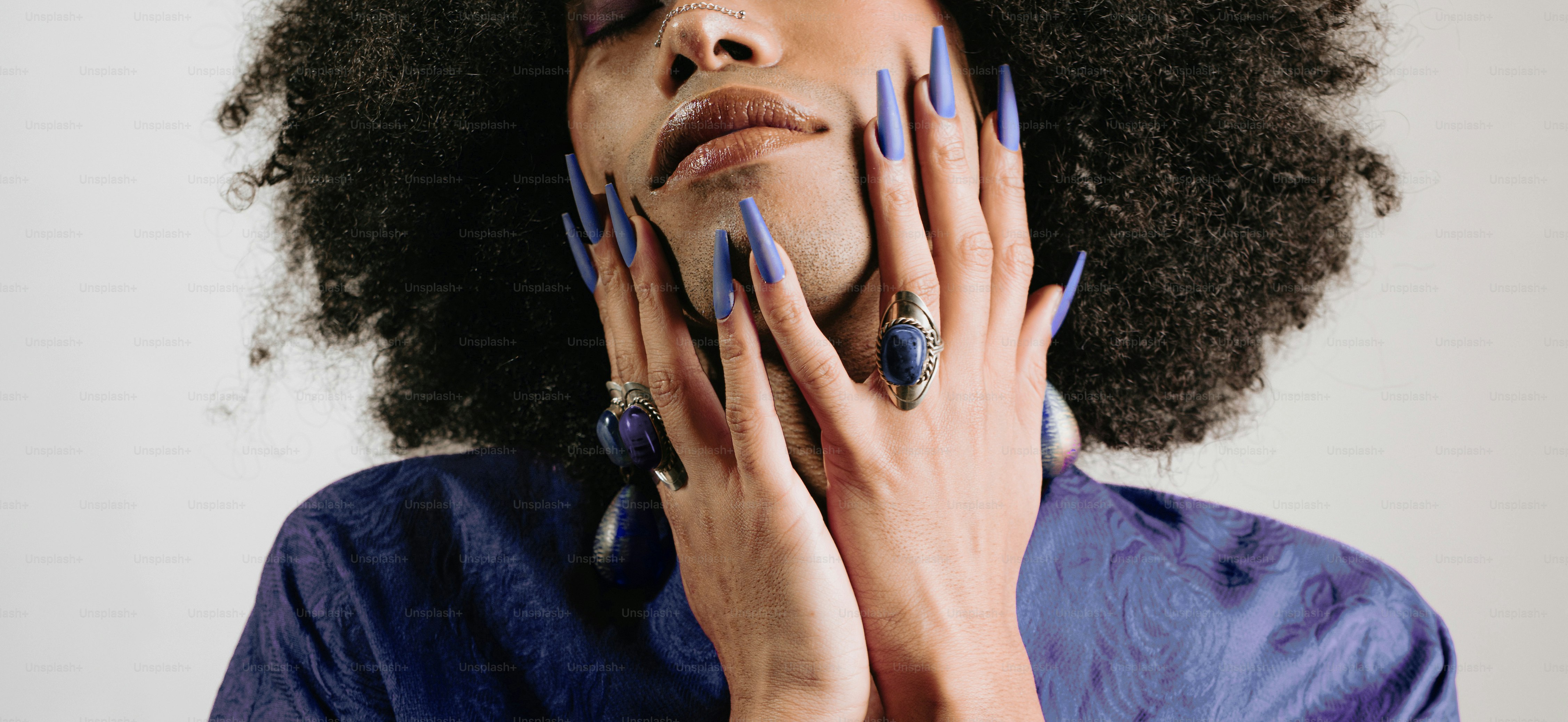 A woman with her hands on her face