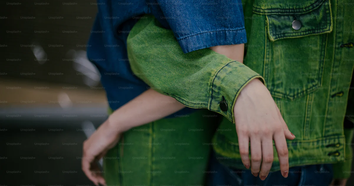 Hugged Object A close up of two people hugging each other photo – Fashion Image on ...