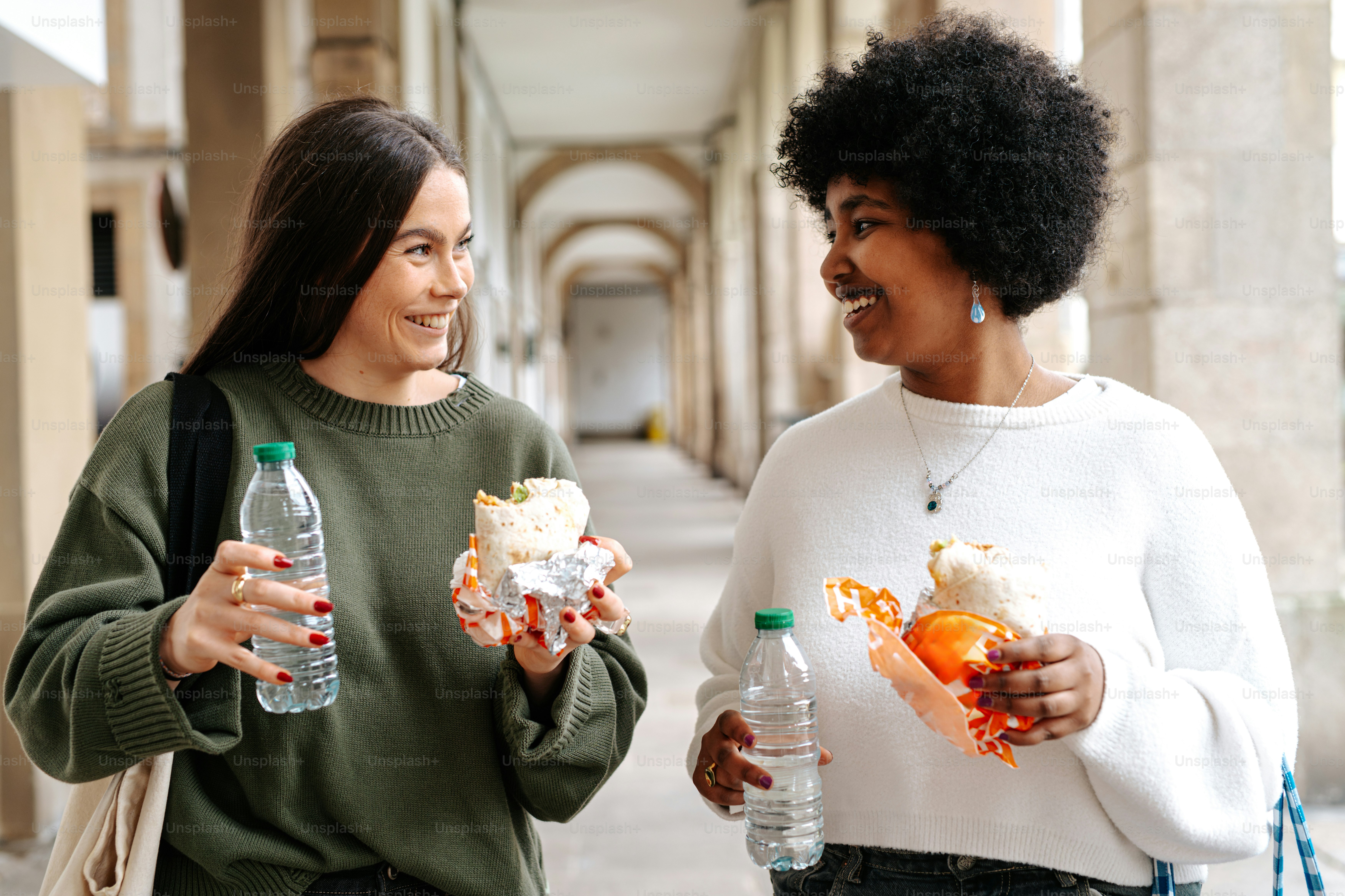 A couple of women standing next to each other