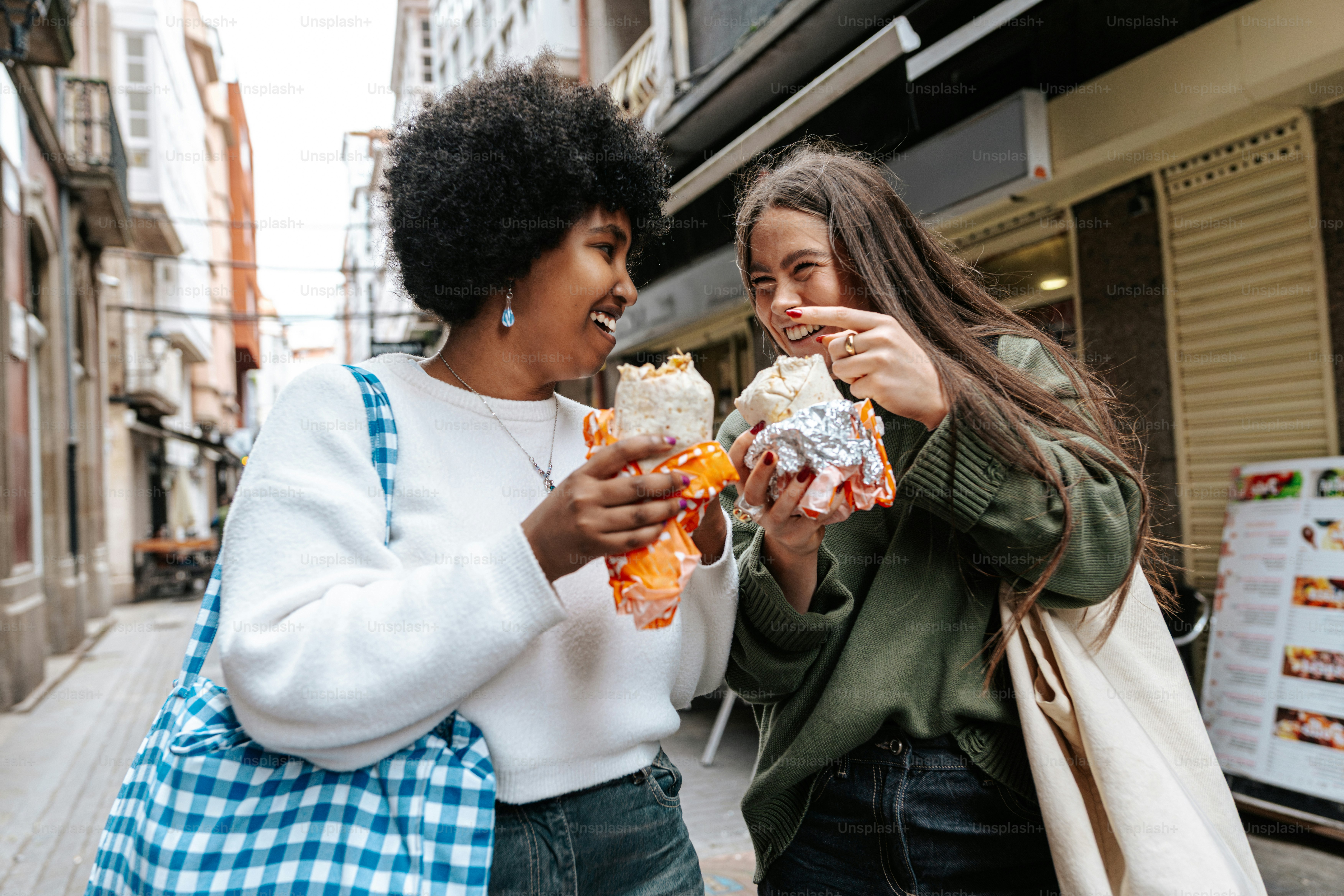 A couple of women standing next to each other