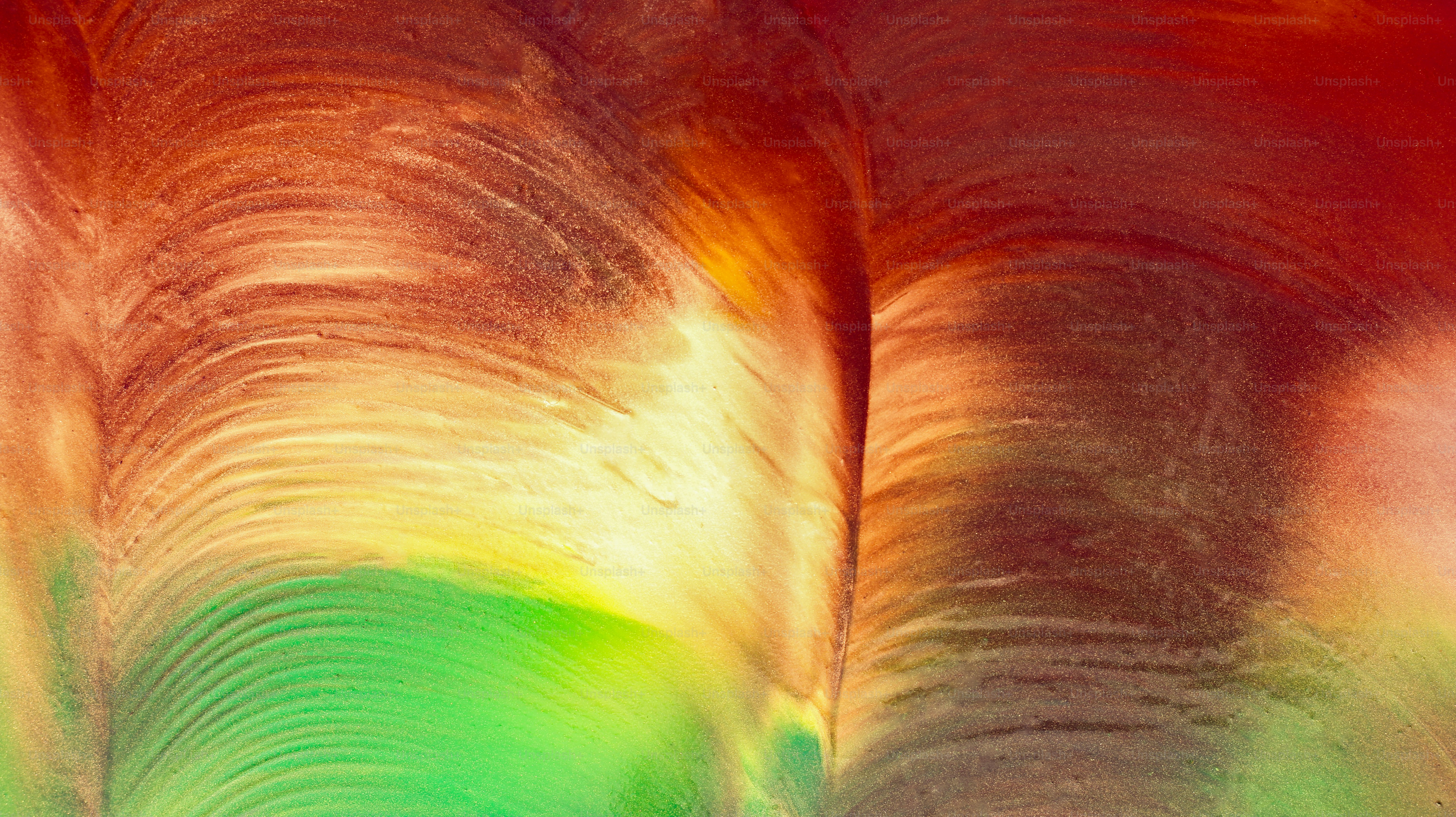 Abstract swirl of colors in warm tones.