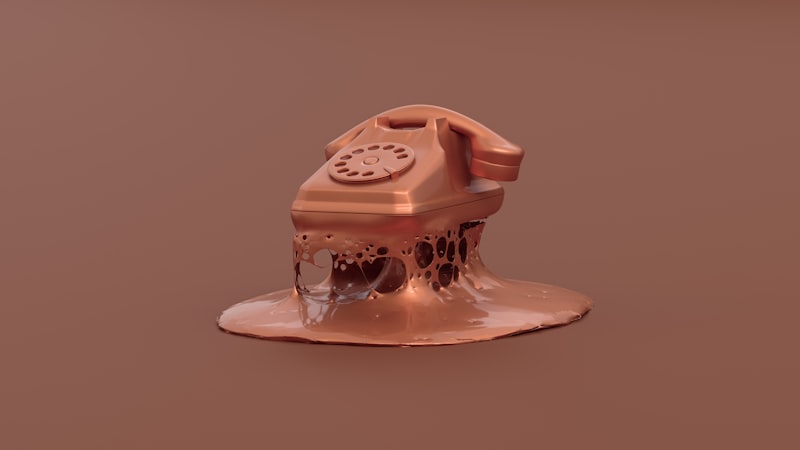 A copper telephone melting and dissolving, symbolizing revenue lost to unanswered calls