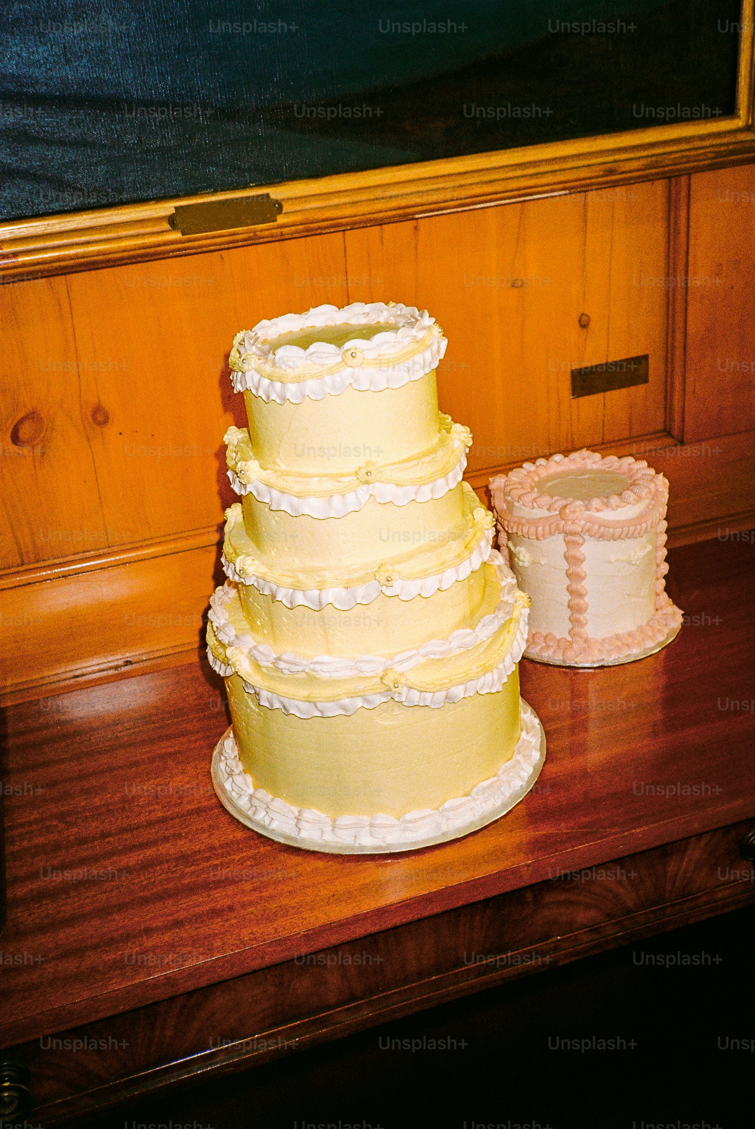 Wedding cakes on a wooden table.