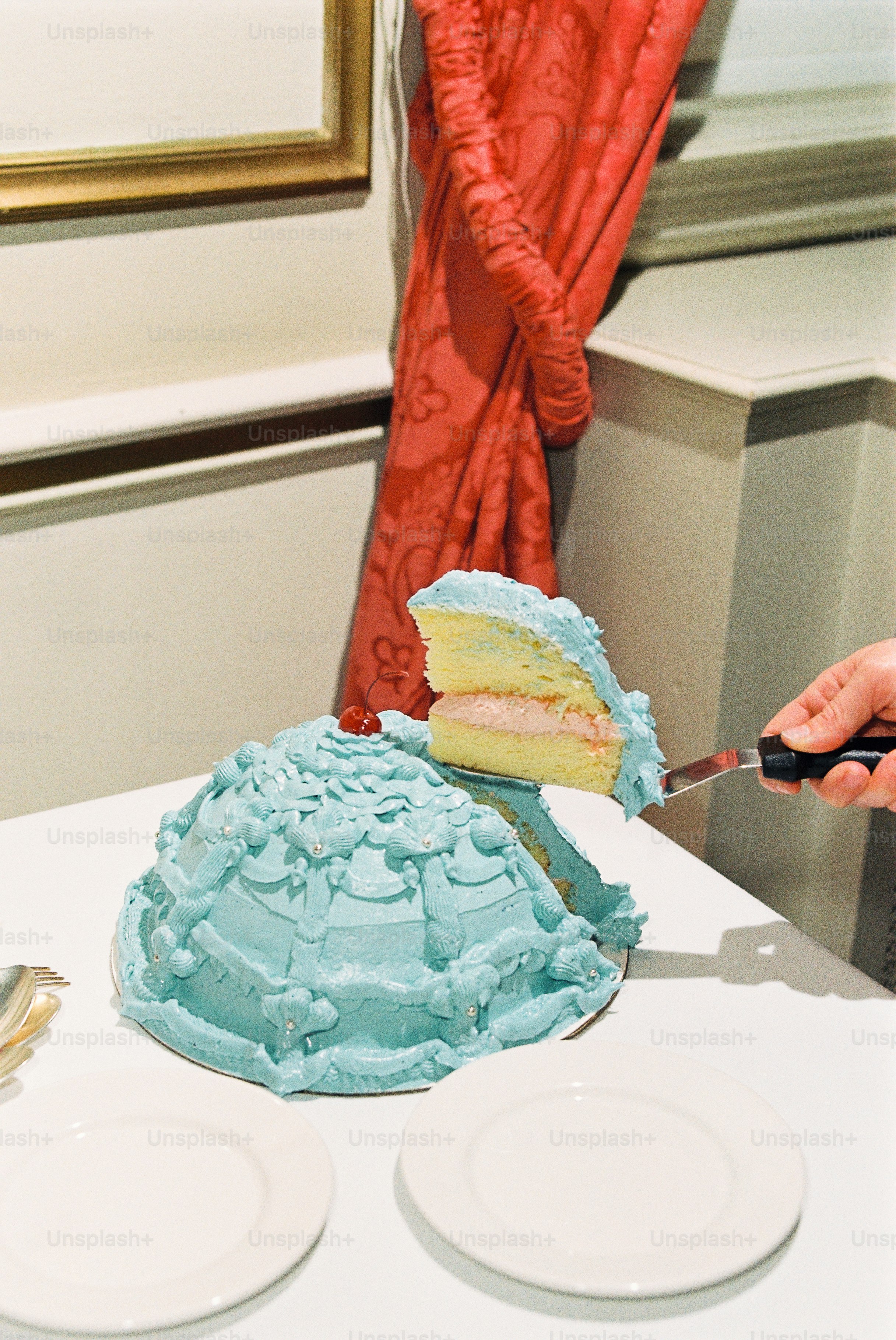 A fancy cake is being served.