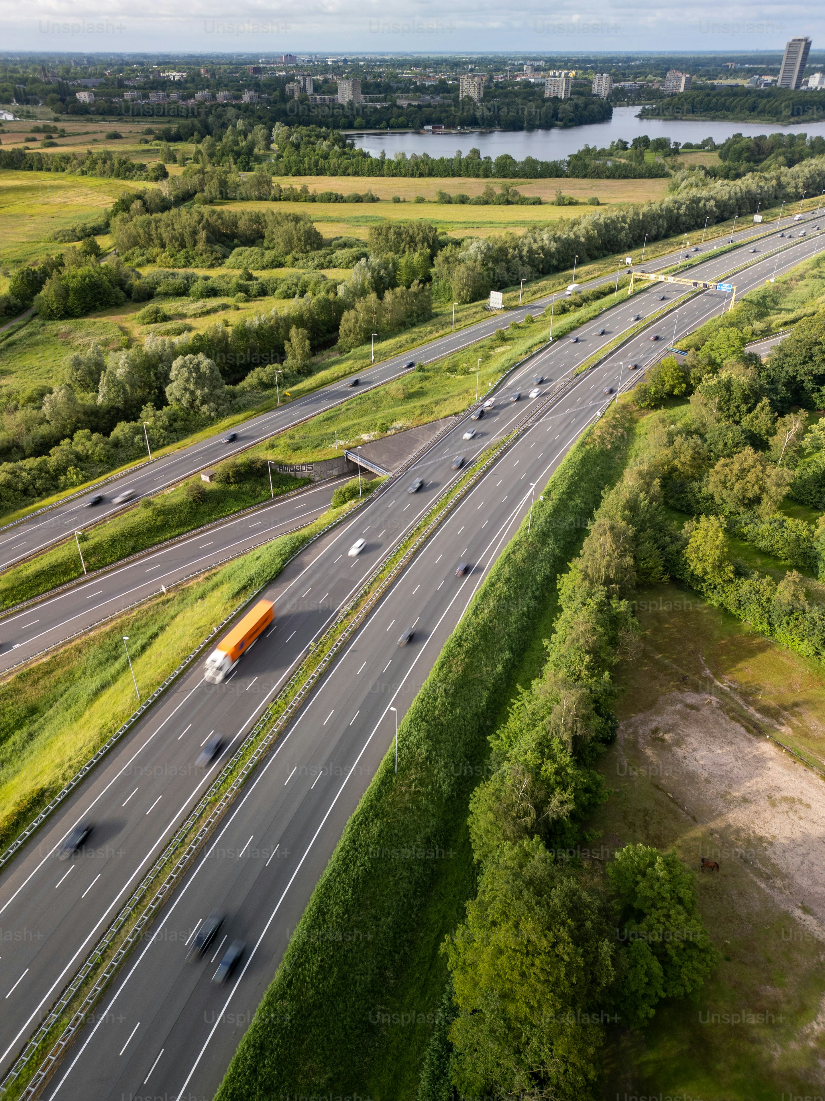 An aerial view of a highway with traffic.