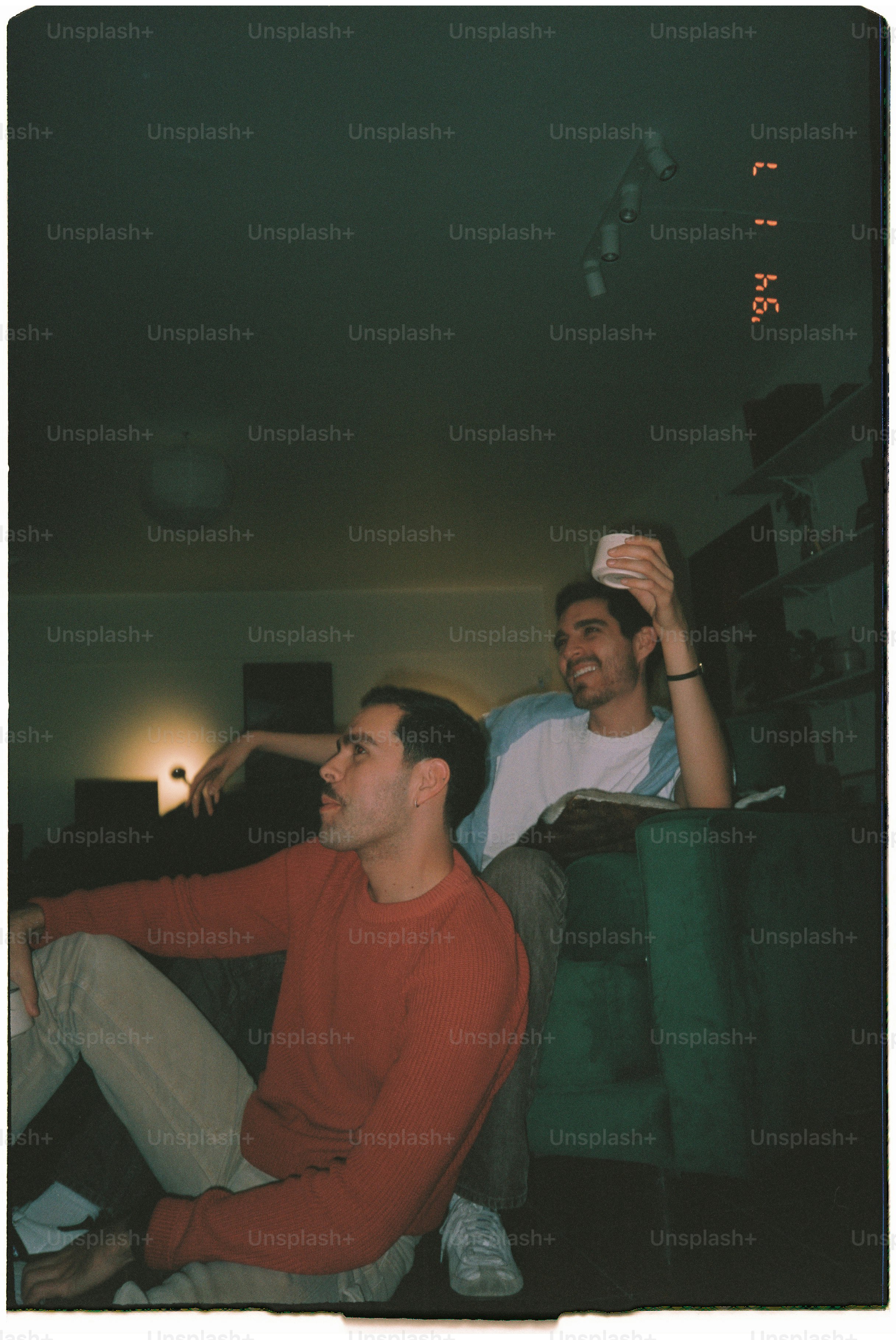 Two men are playfully interacting and laughing. photo – Love Image on ...