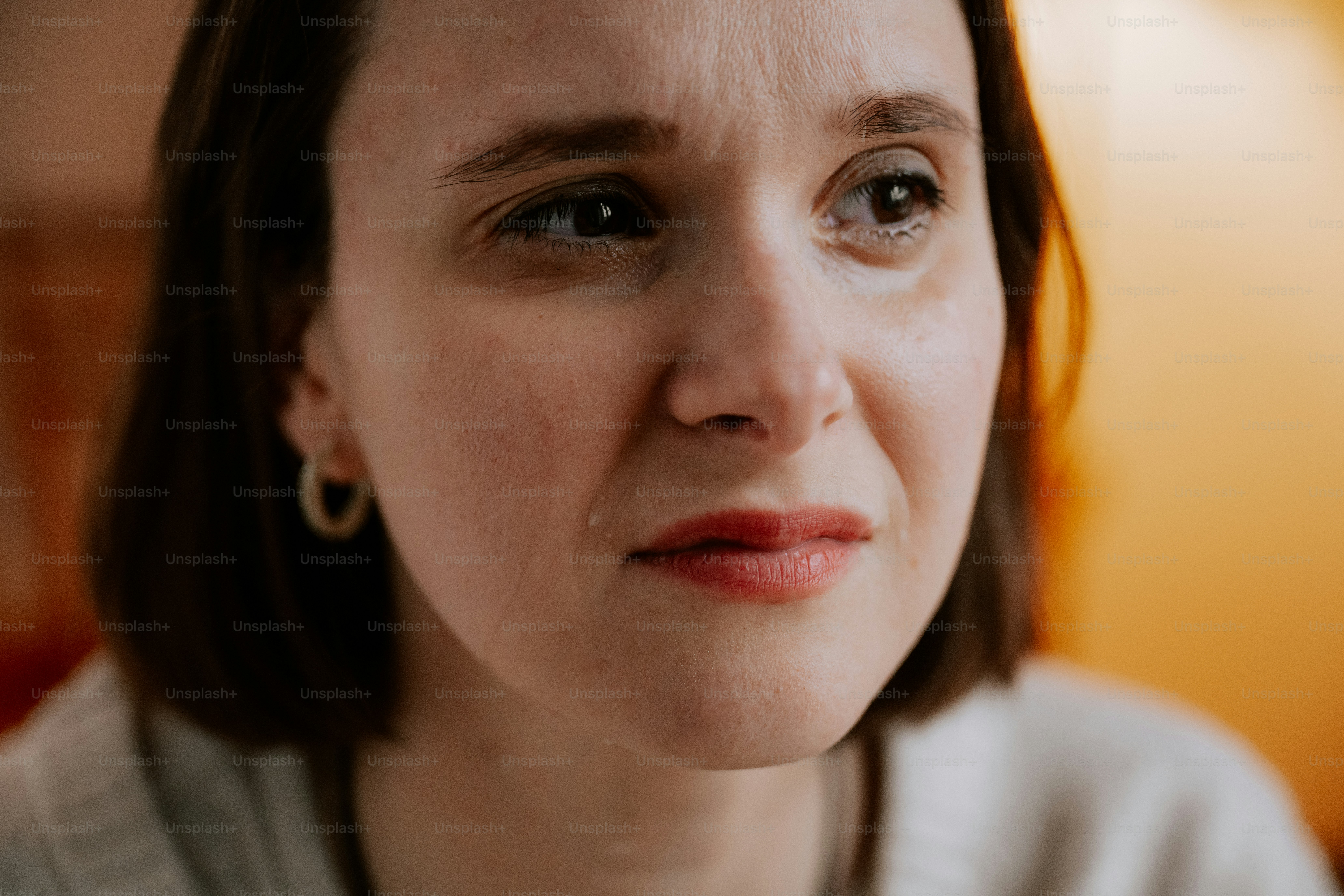 A woman appears to be sad or upset.