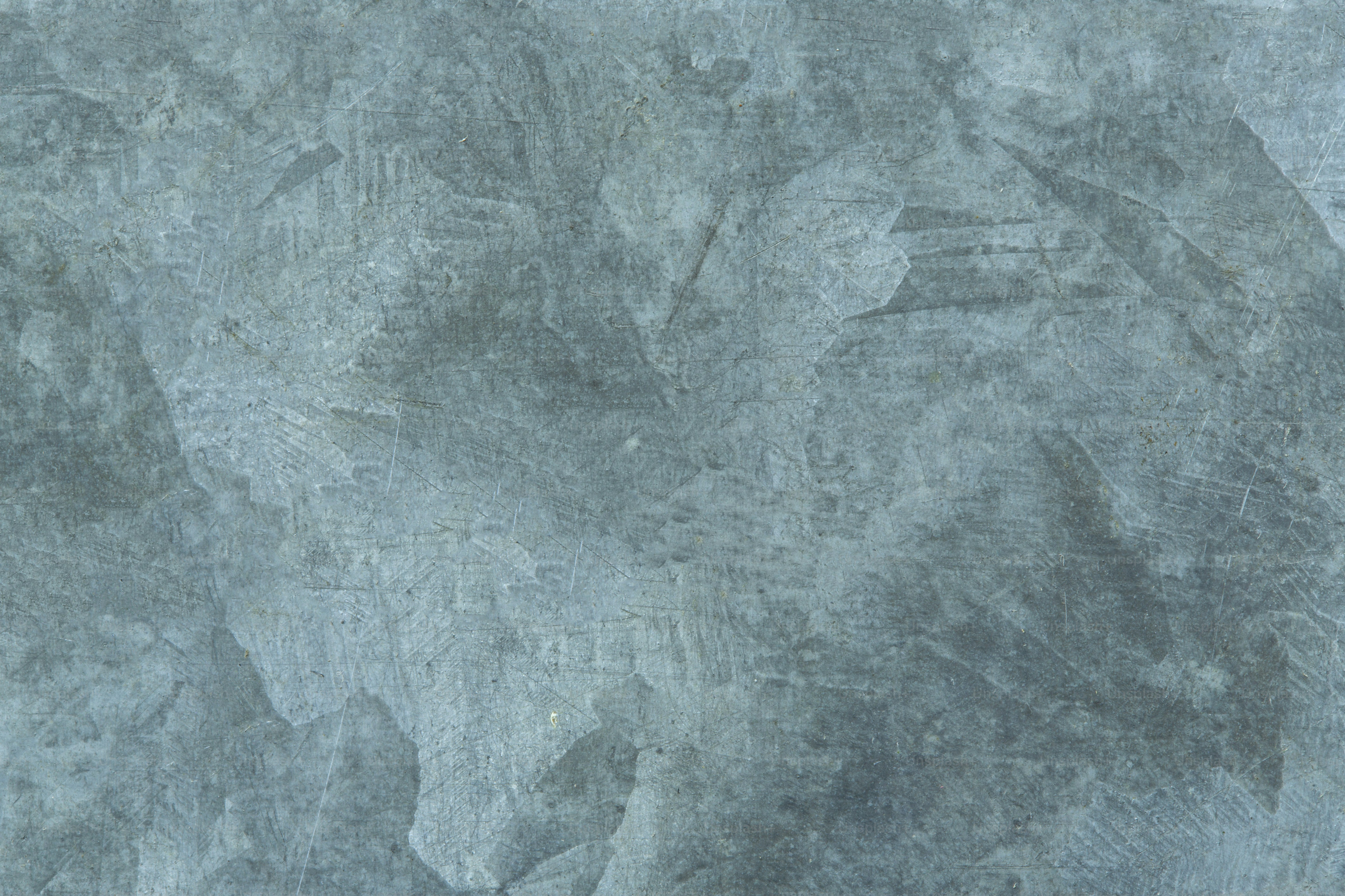 Textured, abstract background in shades of gray.