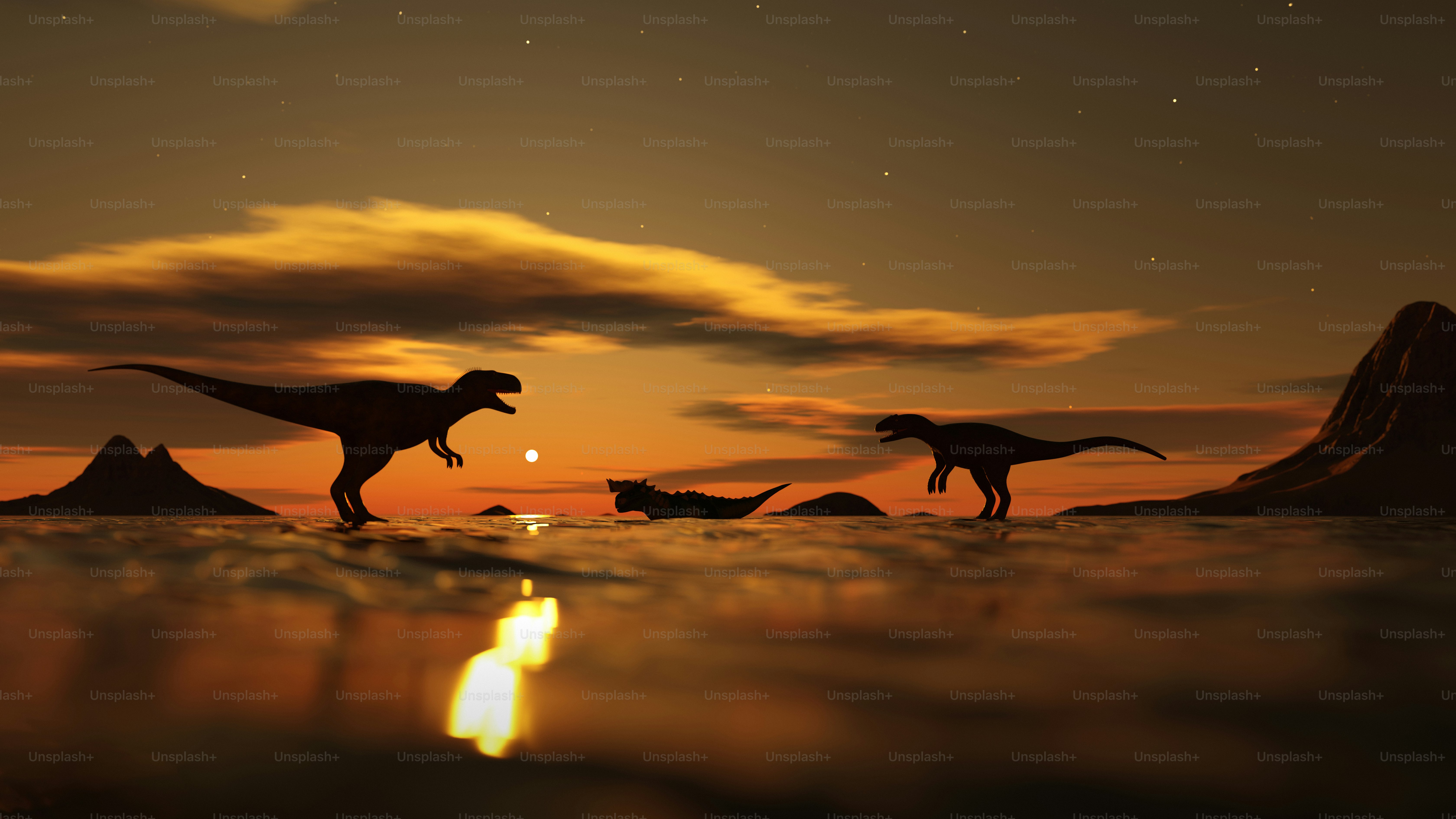 Dinosaurs silhouetted on a sunset water scene.