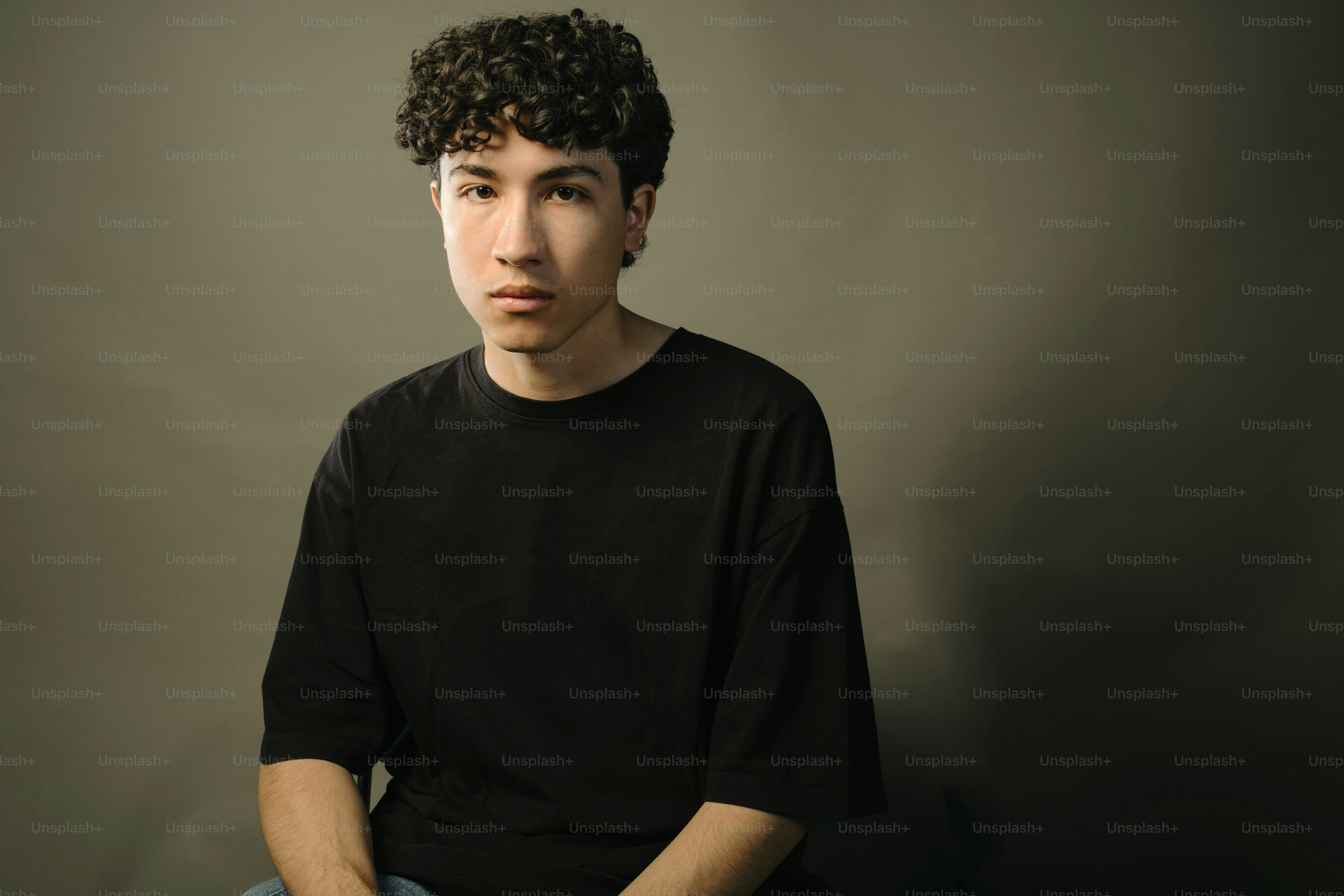 Young man poses for a portrait