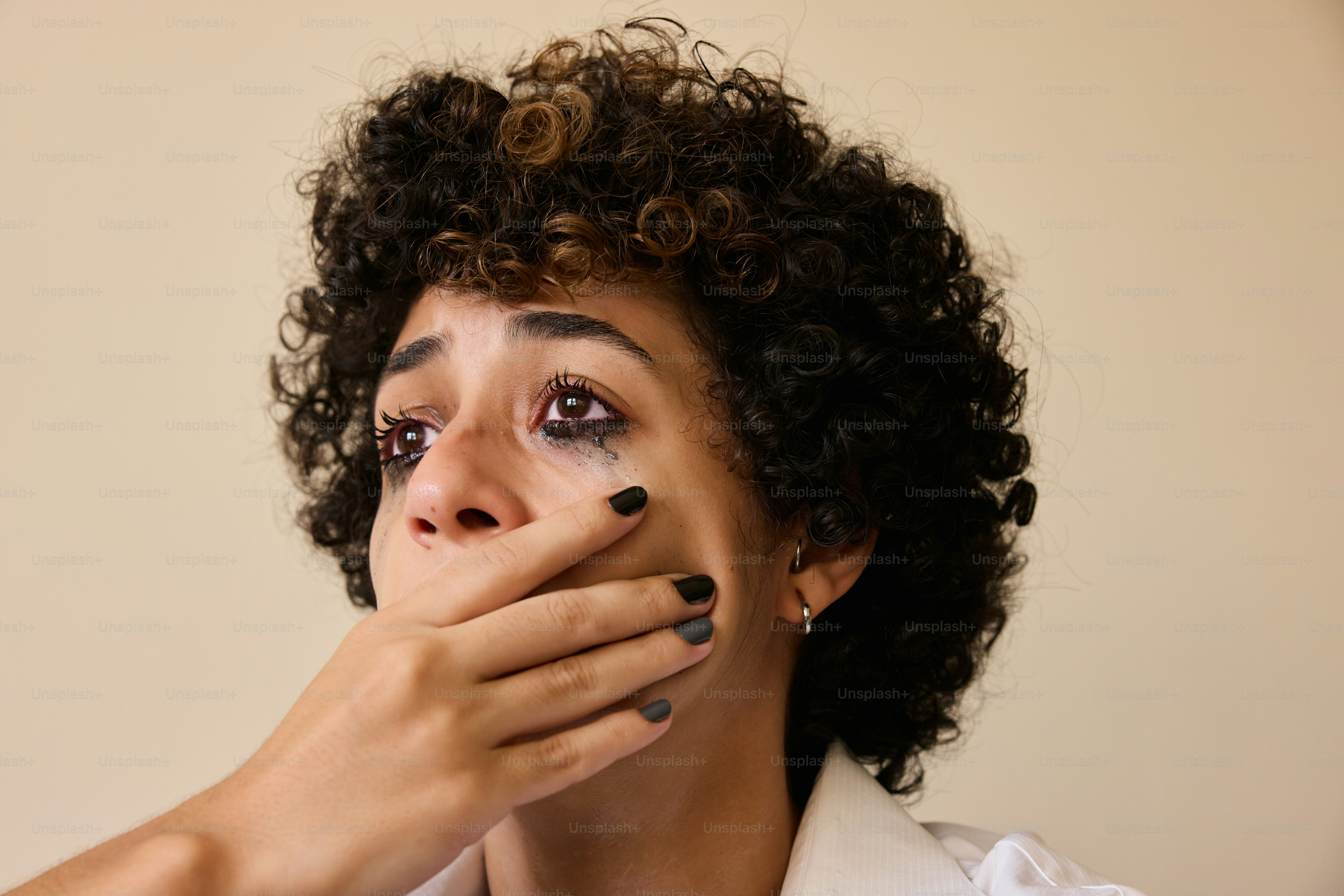 Someone is silencing and suppressing this woman.